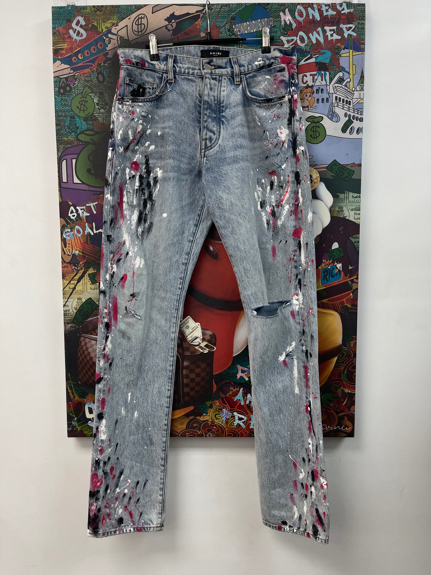 Amiri Light Wash Paint Splatter Jeans