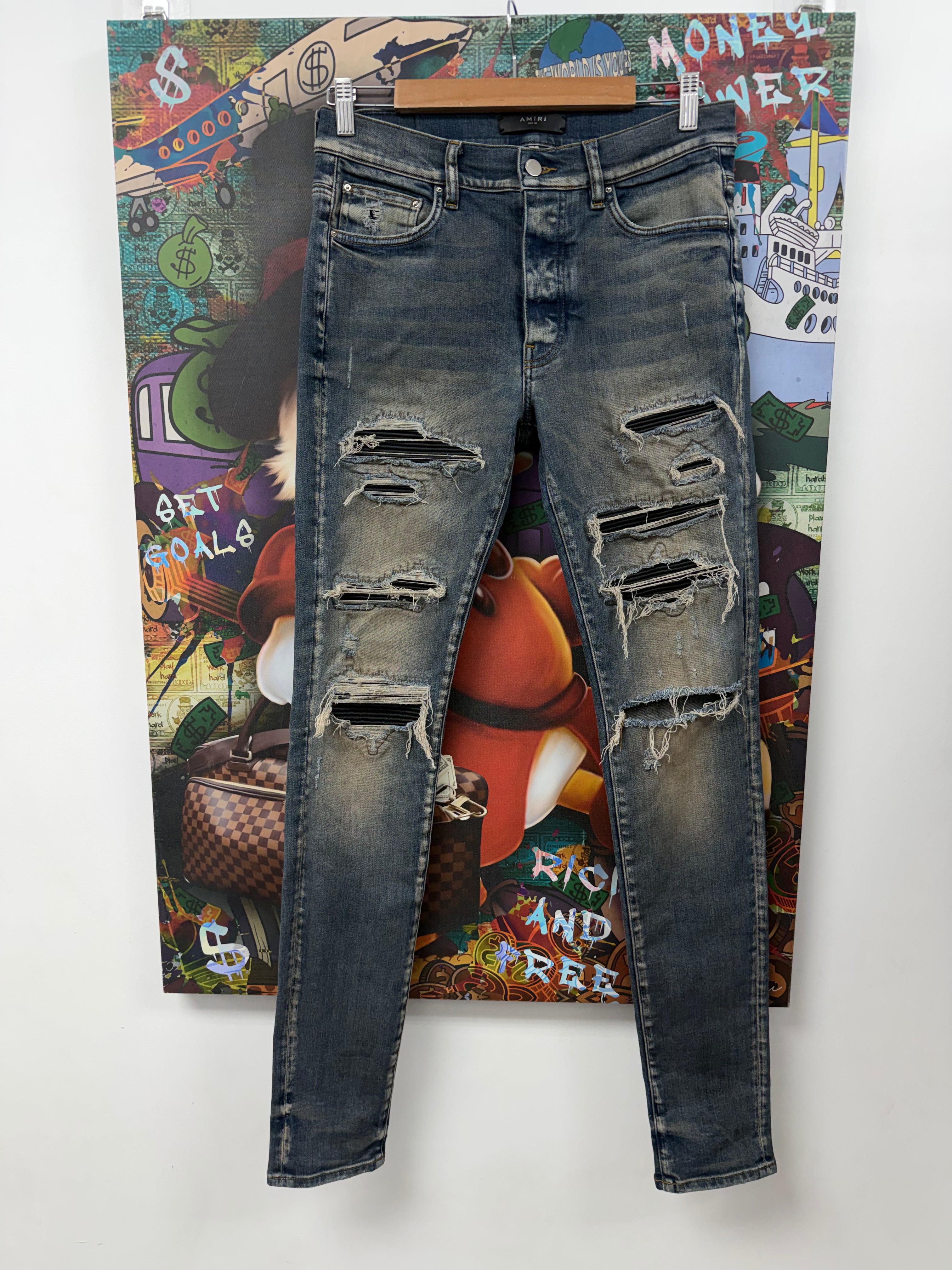 Amiri MX1 Rust Black Thrasher Patch Jeans