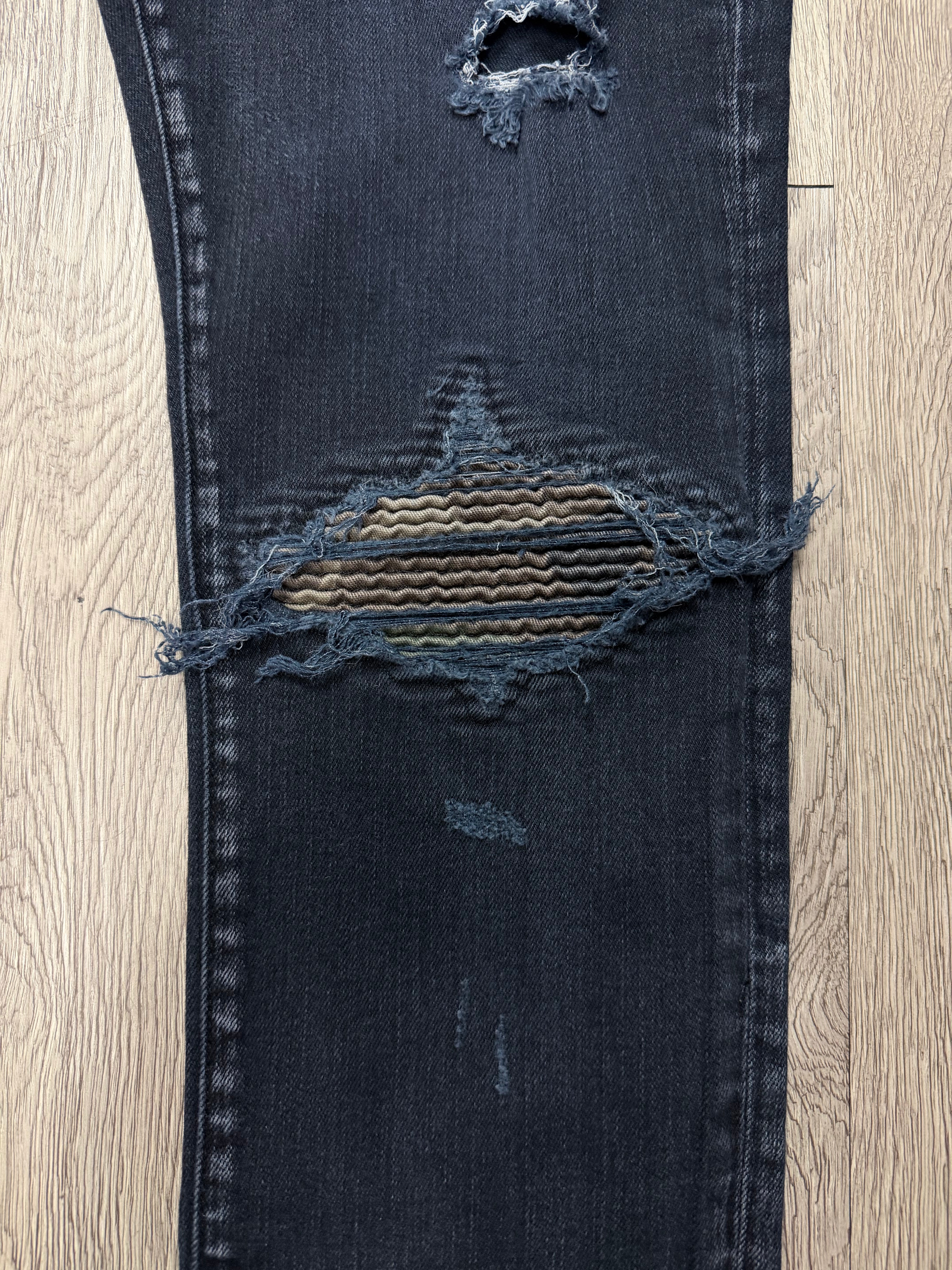 Amiri MX1 Black Camo Patch Jeans