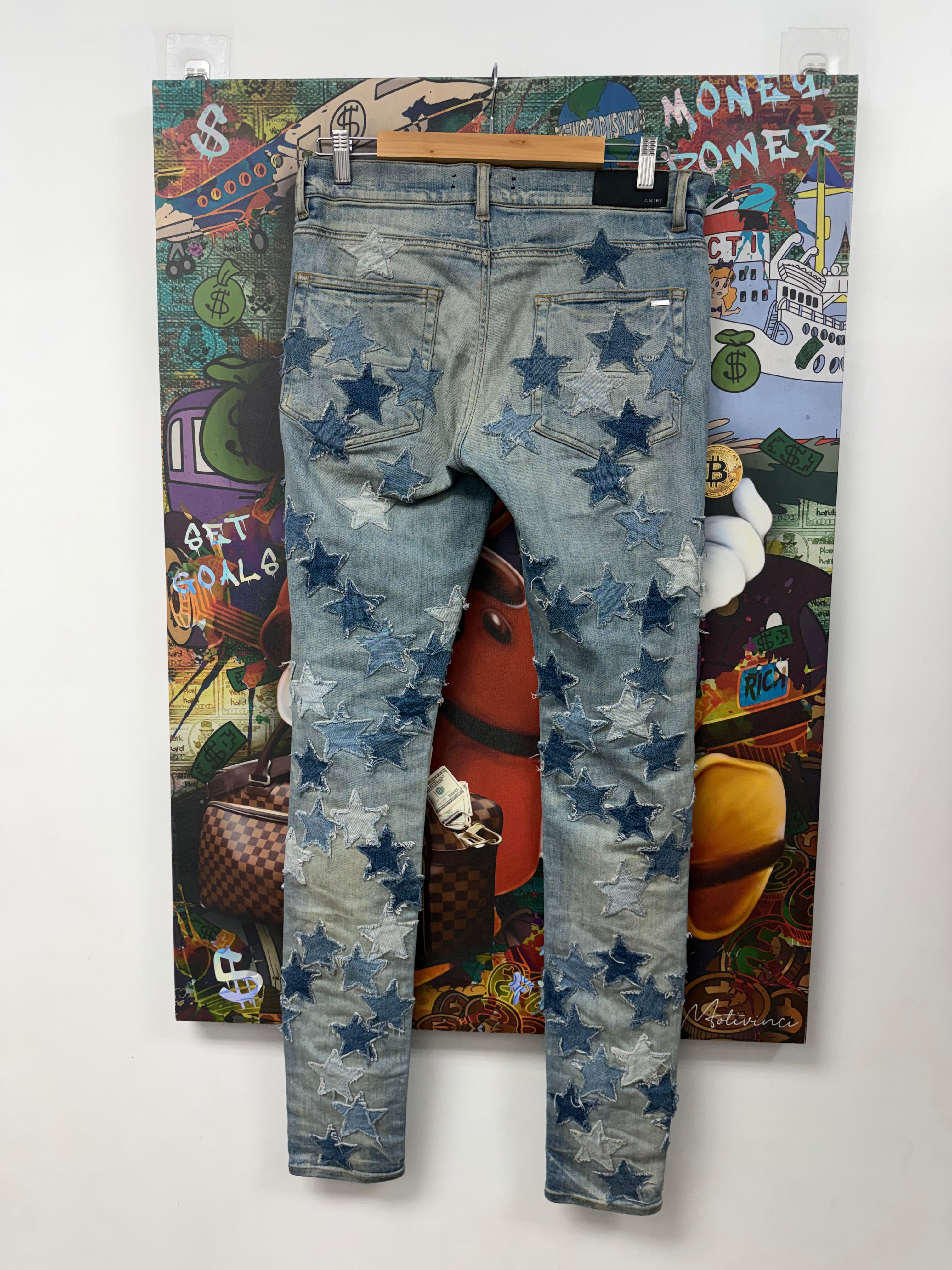 Amiri Light Wash Denim Chemist Stars Jeans