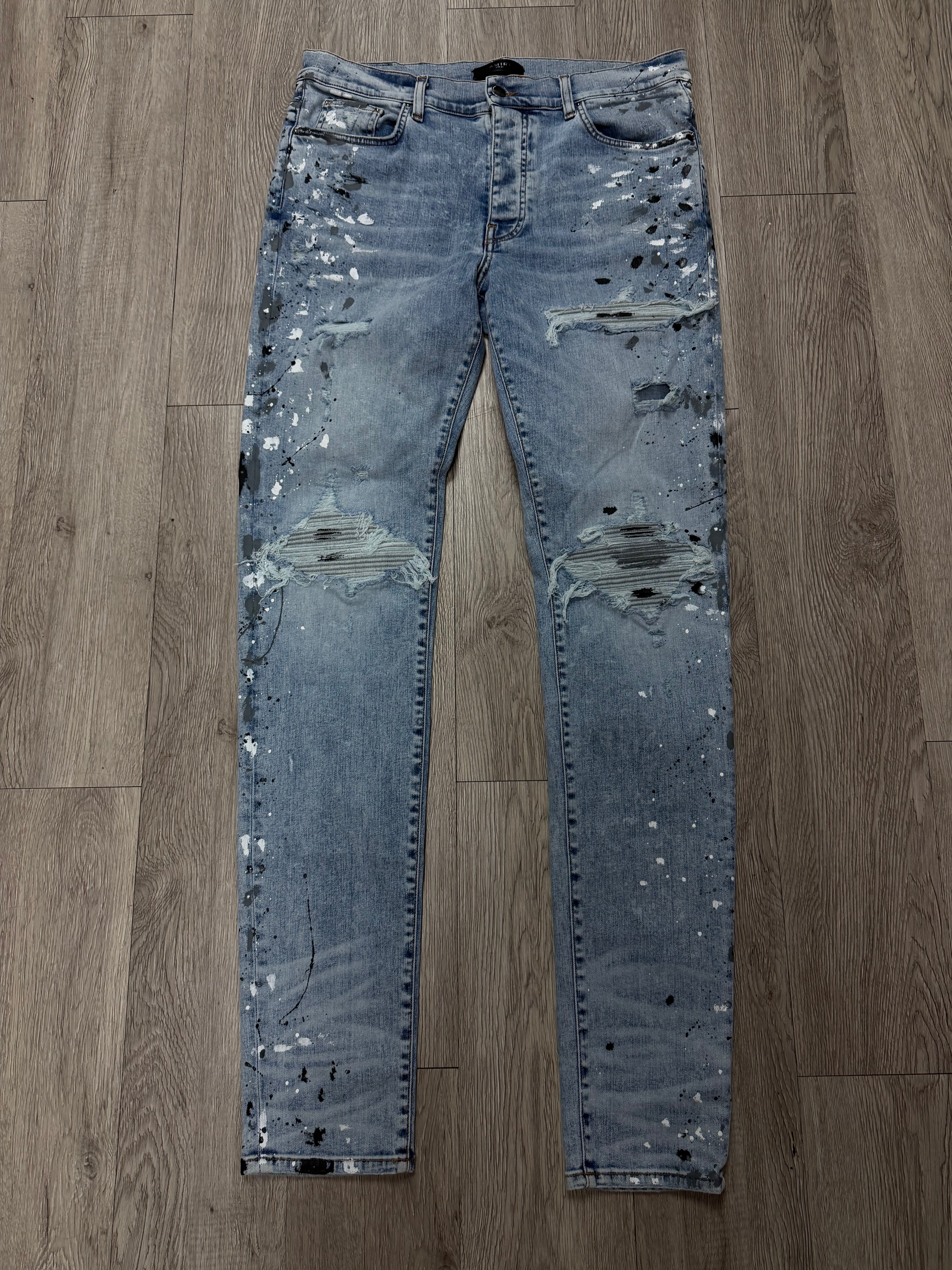 Amiri MX1 Light Wash Paint Splatter Jeans