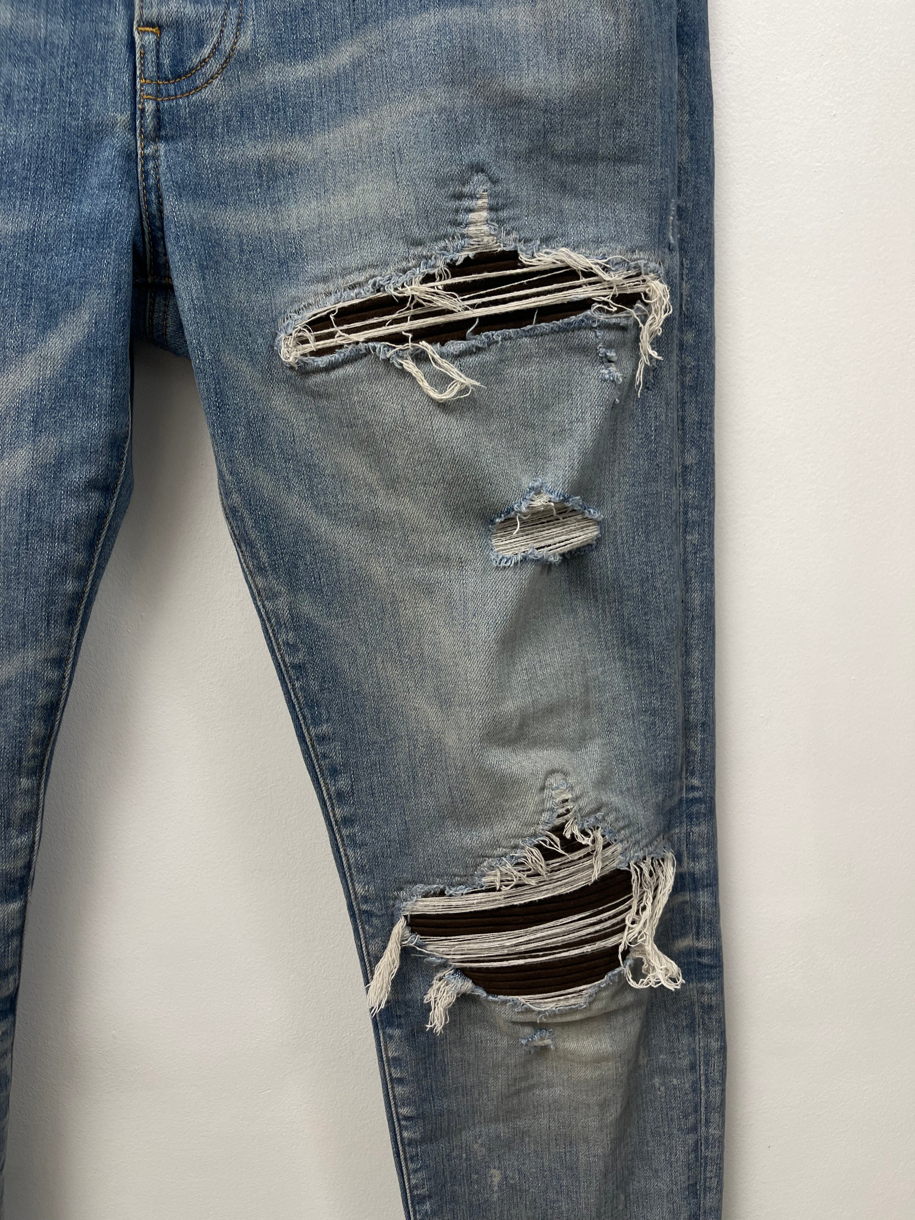 Amiri MX1 Light Wash Brown Patch Jeans