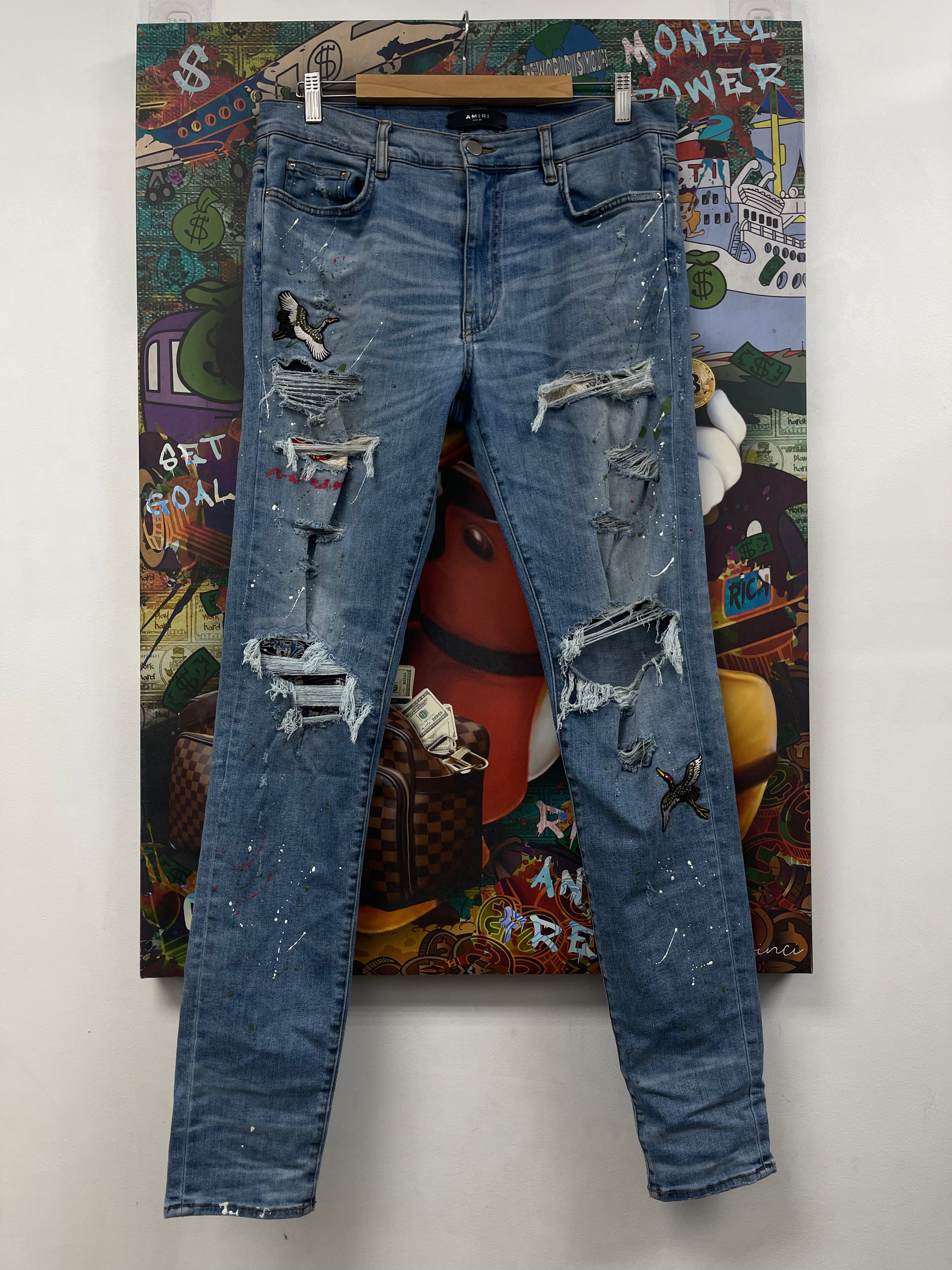 Amiri Light Wash Swan Patch Jeans