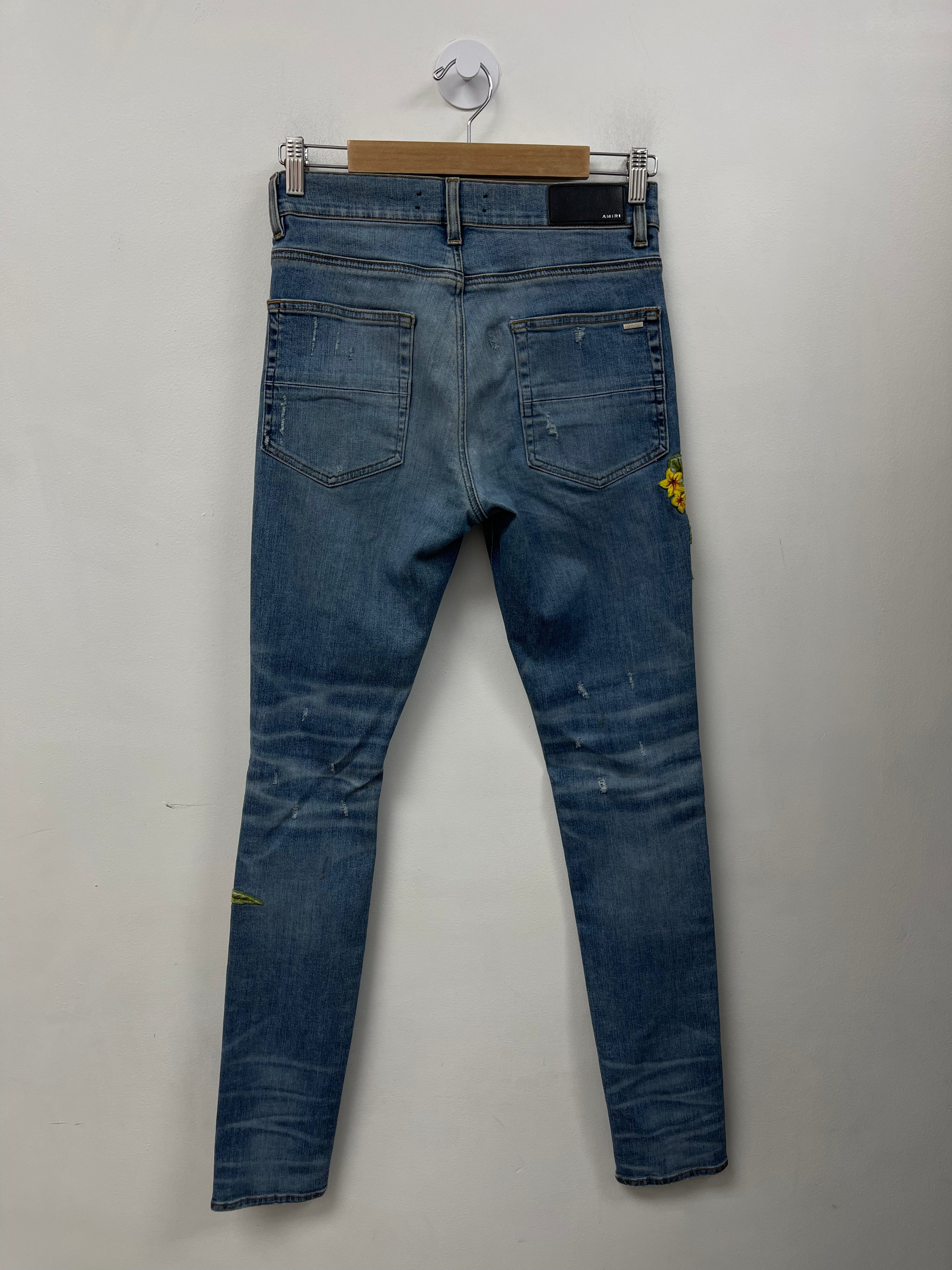 Amiri Light Wash Floral Patchwork Jeans