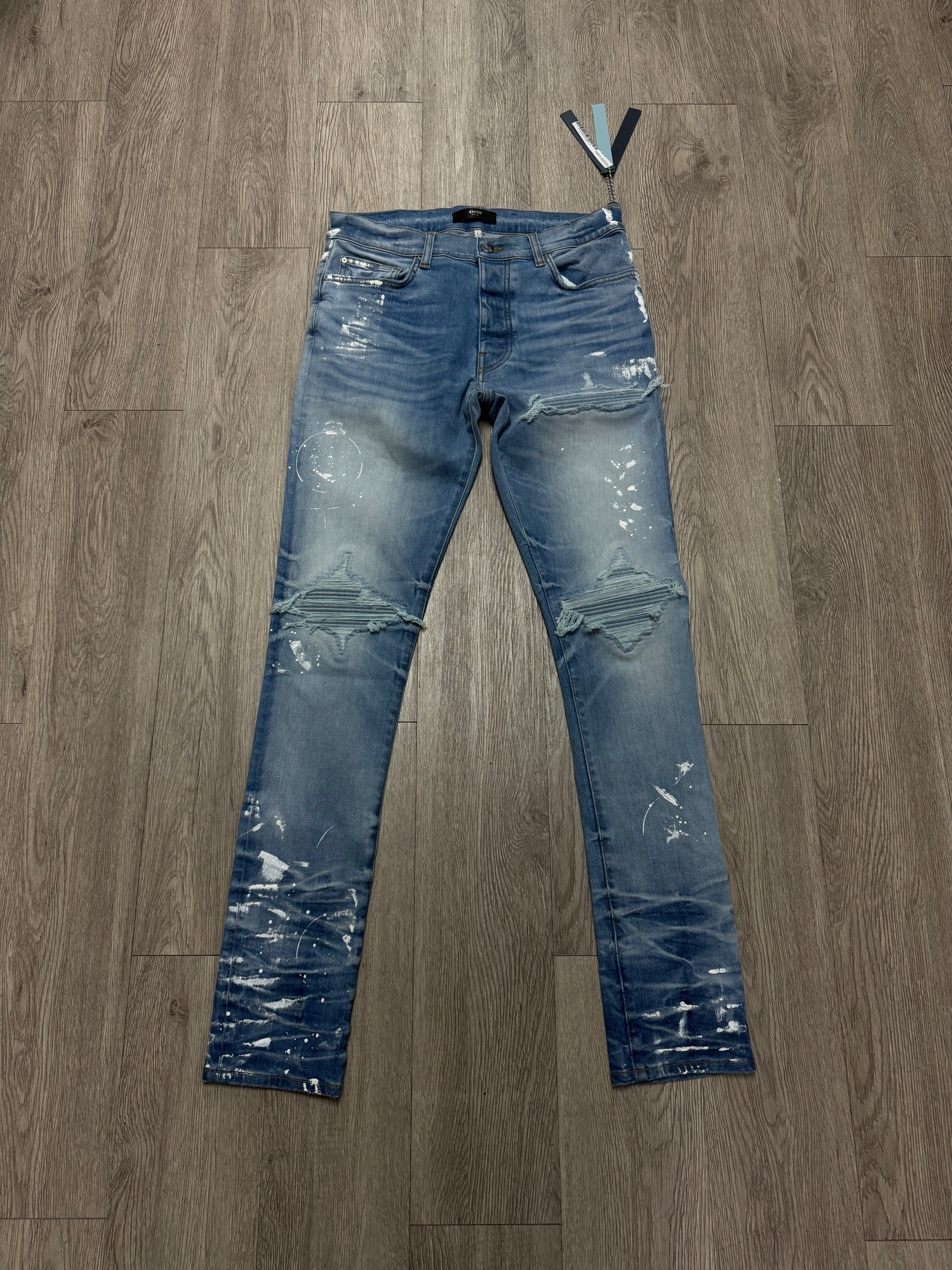 Amiri Light Wash White Splatter Denim Patch MX1 Jeans