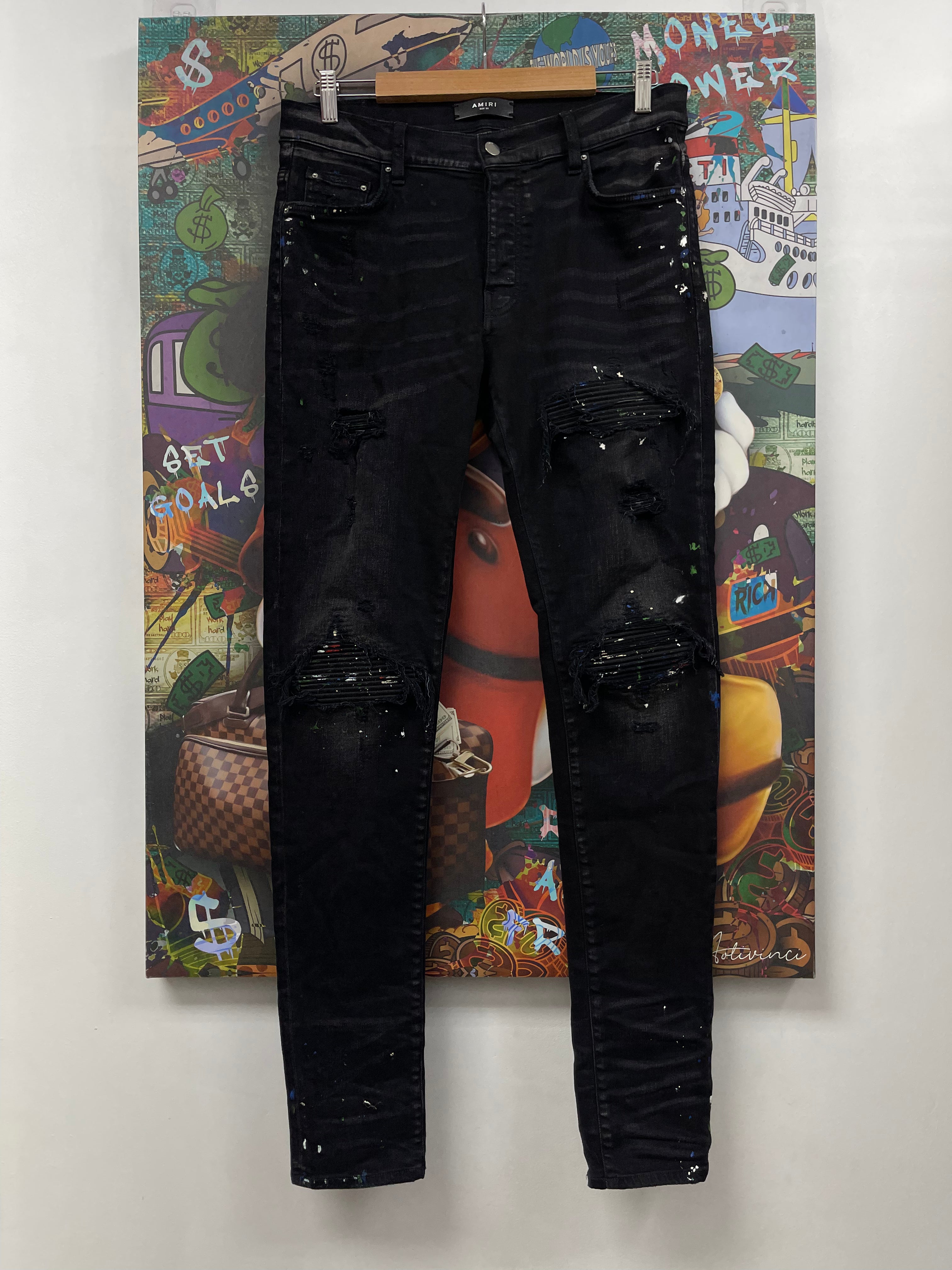 Amiri MX1 Black Wash Denim Splatter Patch Jeans