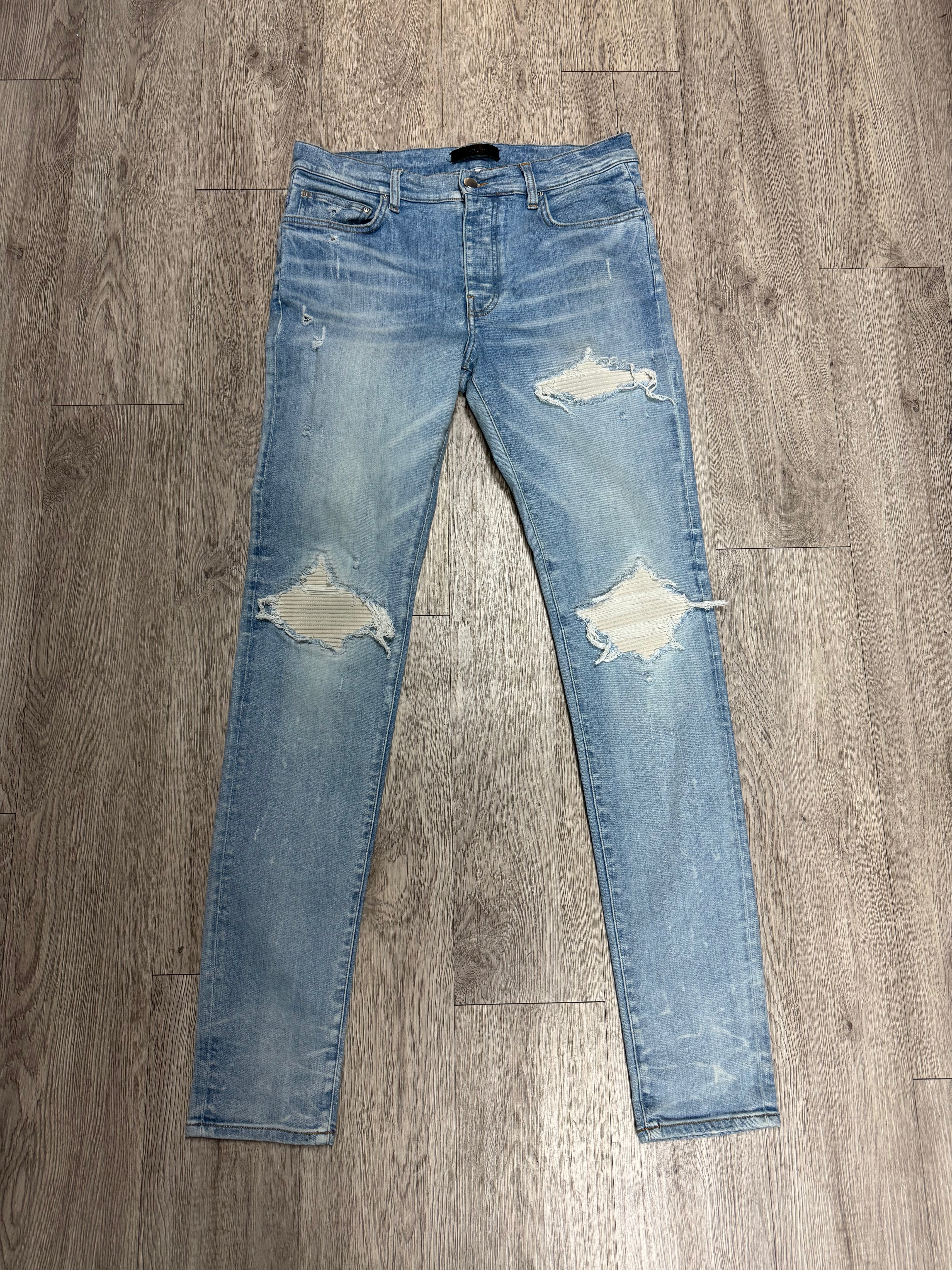 Amiri Light Wash White Patch MX1 Jeans