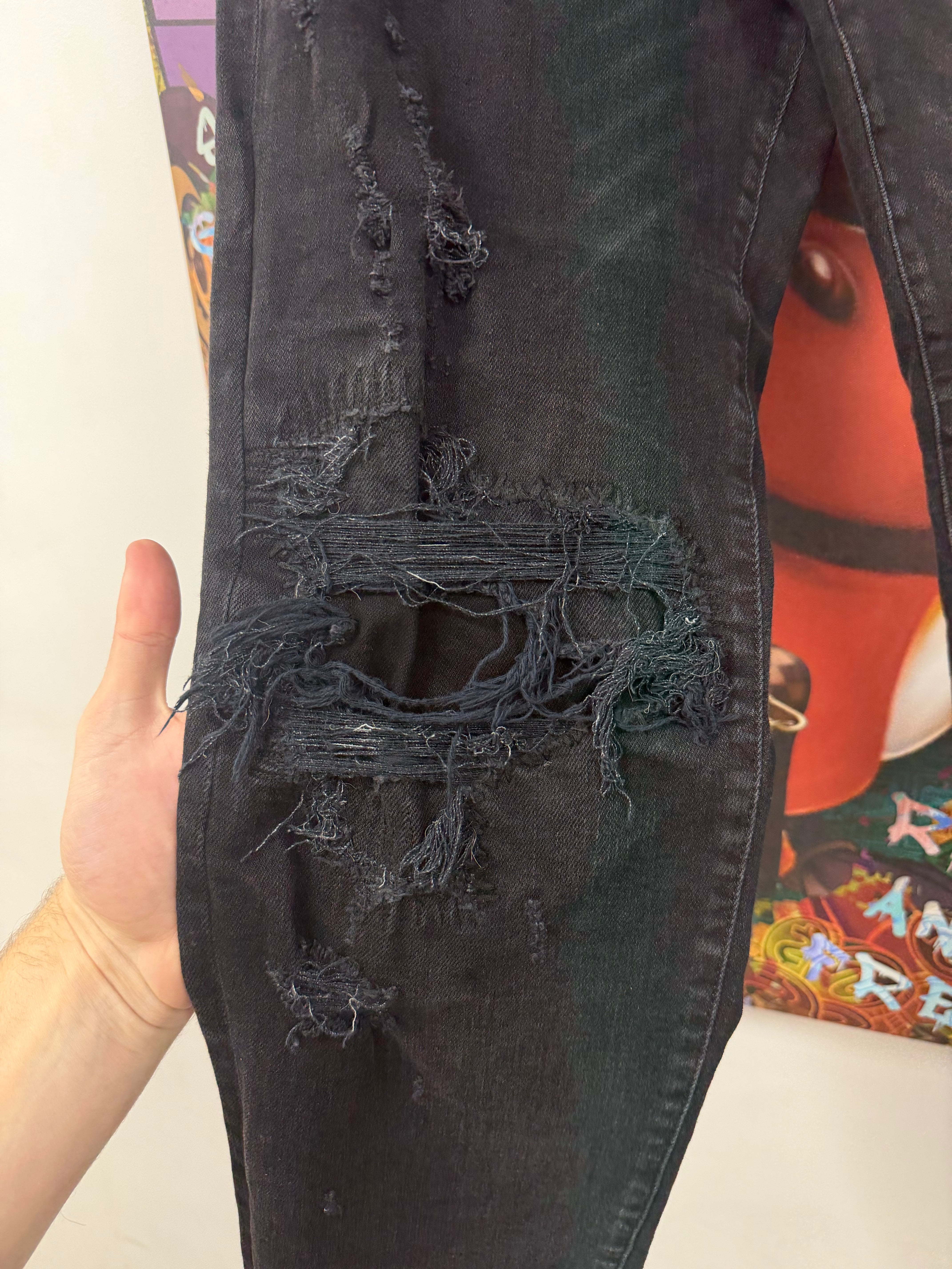 Amiri Black Wash Distressed Patchwork Jeans