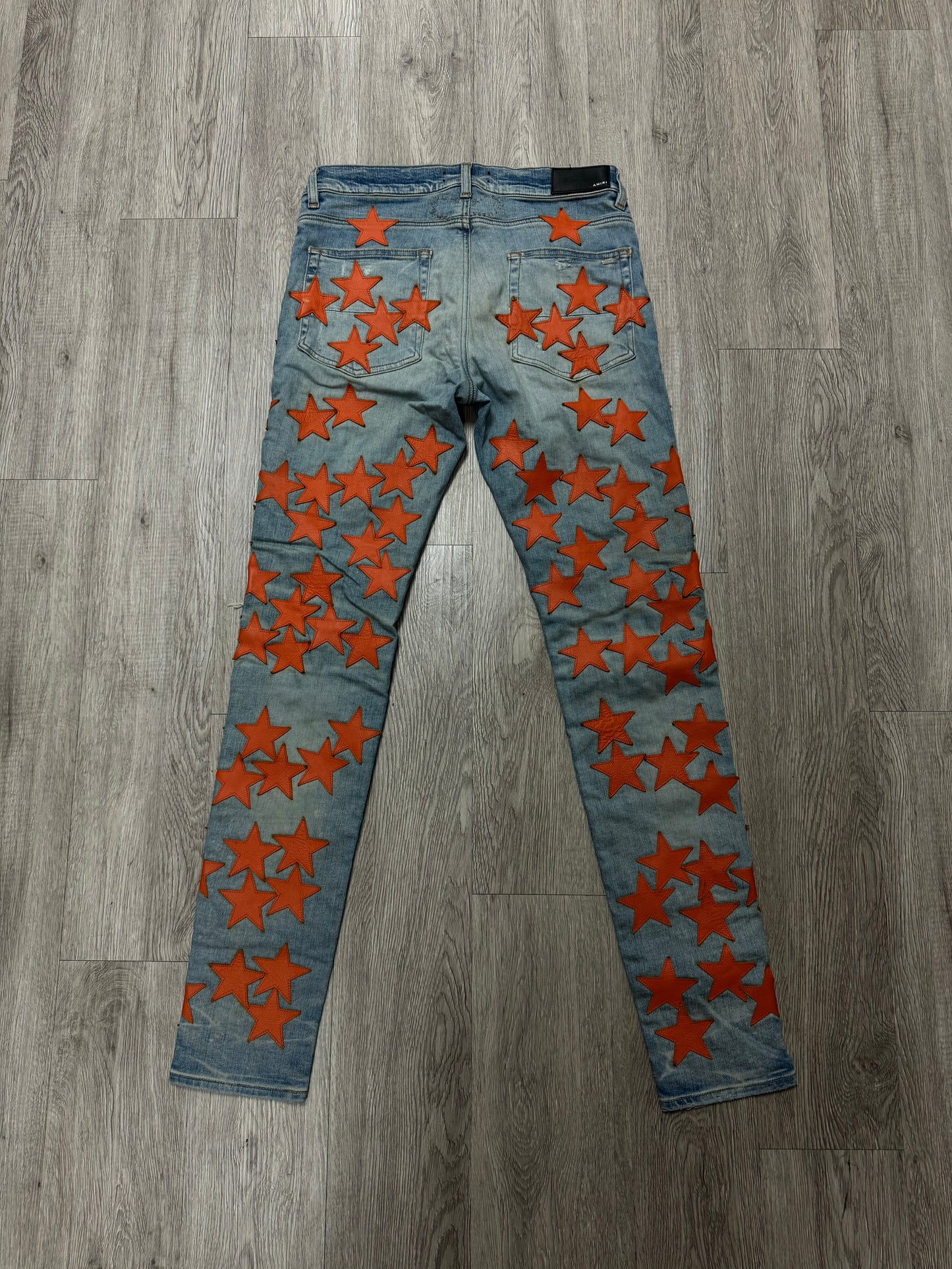 Amiri Chemsit Jeans Light Wash Orange Stars Used