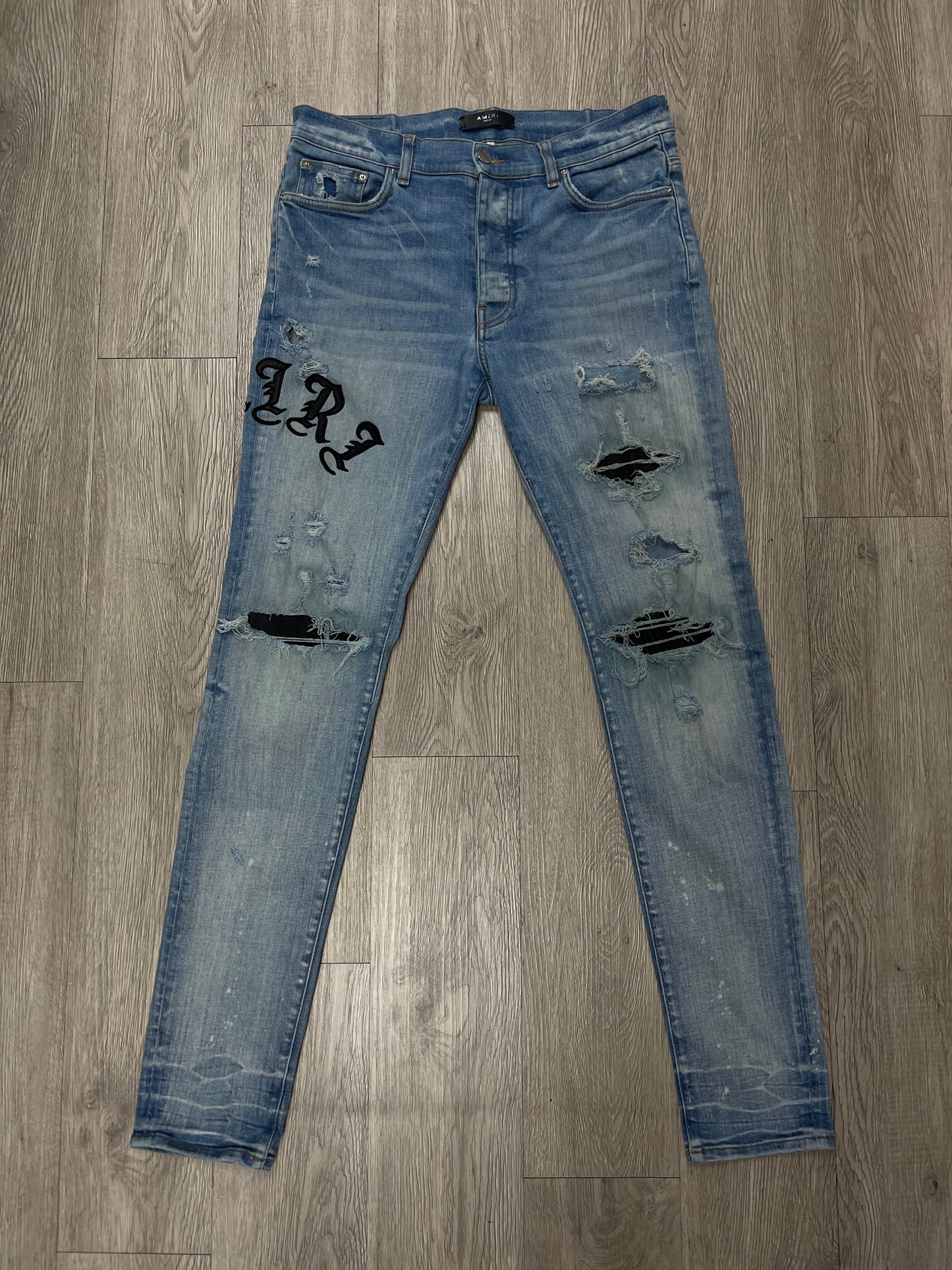 Amiri Light Wash Old English Jeans
