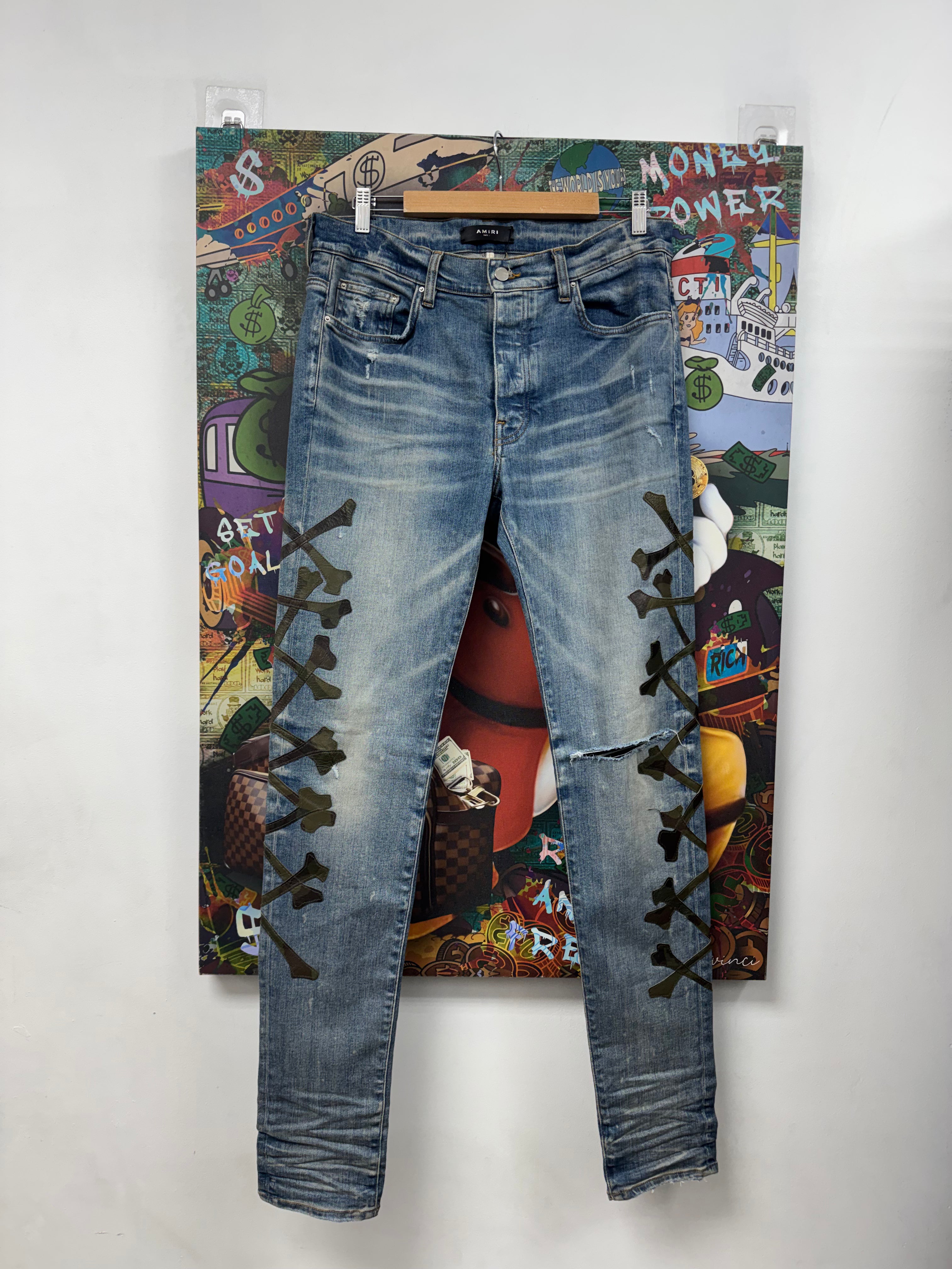 Amiri Light Wash Camo Bones Jeans