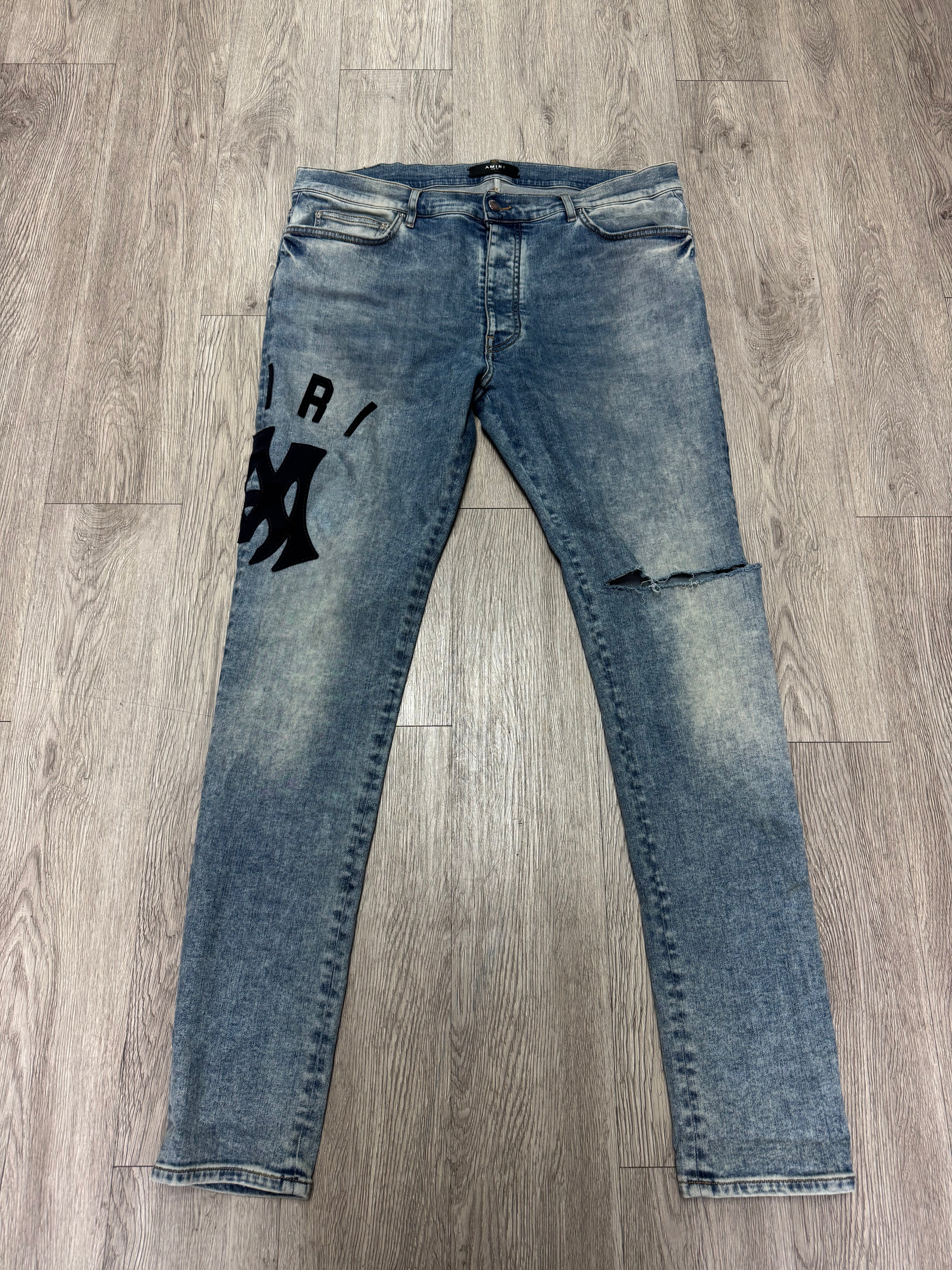 Amiri Light Wash Blue Suede MA Logo Jeans