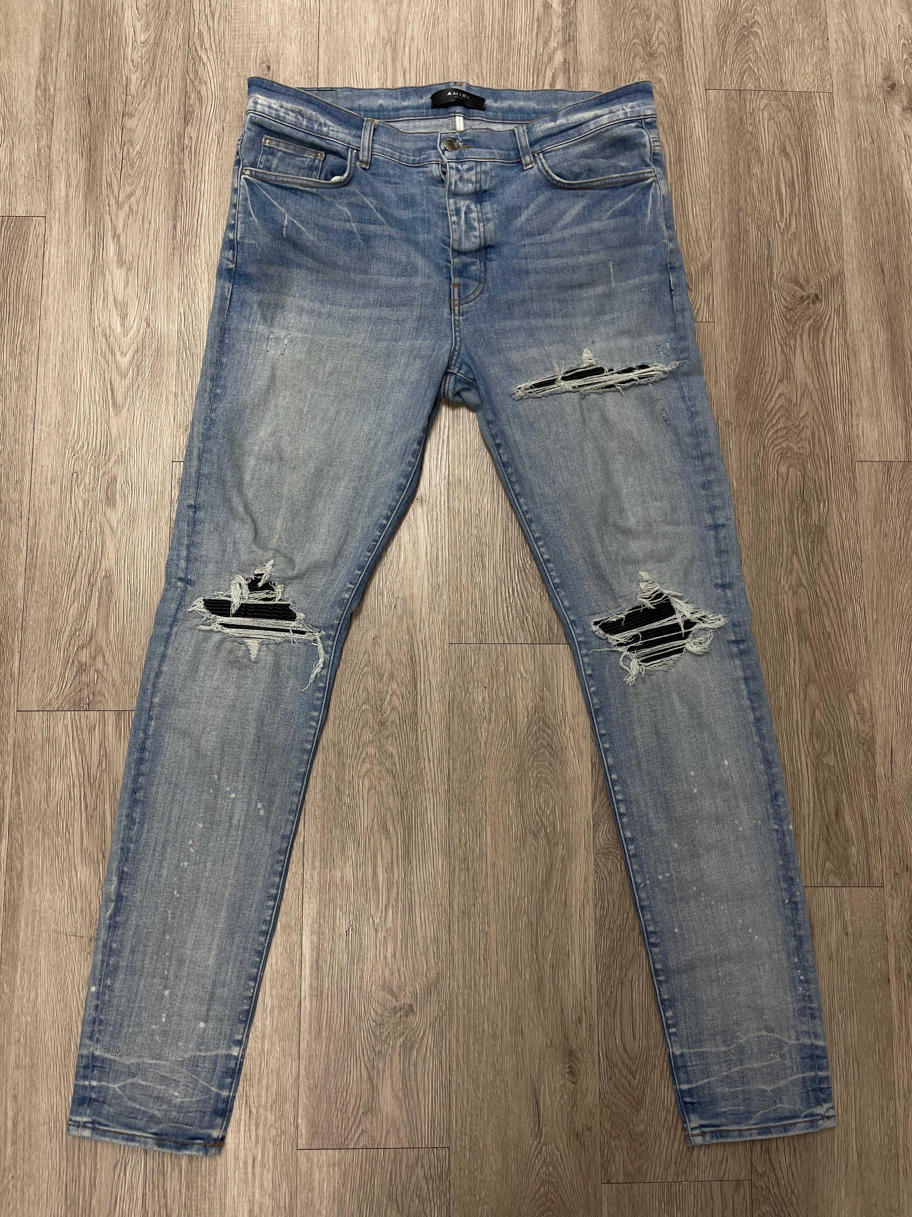 Amiri Mx1 Light Wash Black Patch Jeans