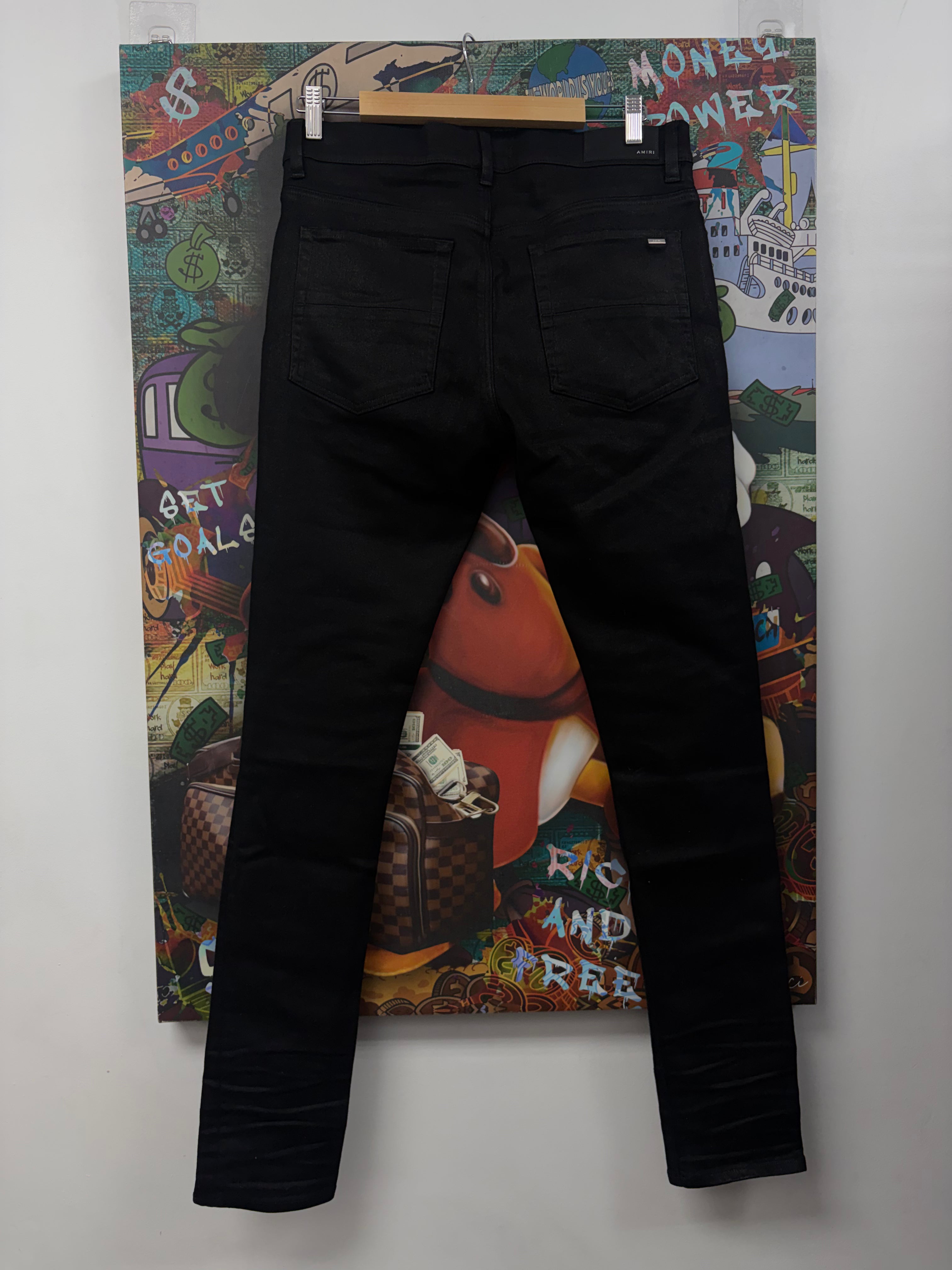 Amiri MX1 Black Wax Patch Jeans