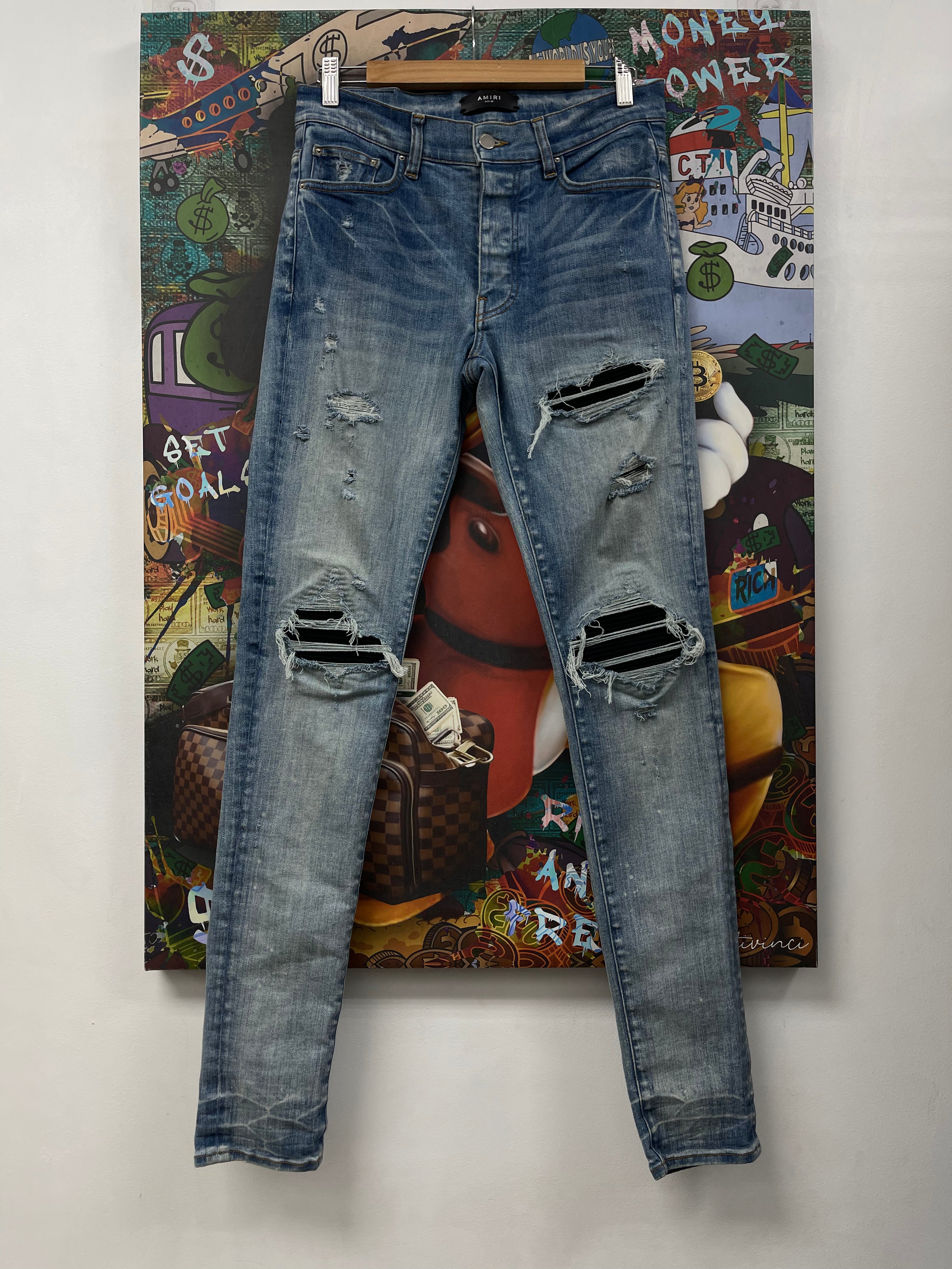 Amiri MX1 Light Wash Black Suede Patch Jeans