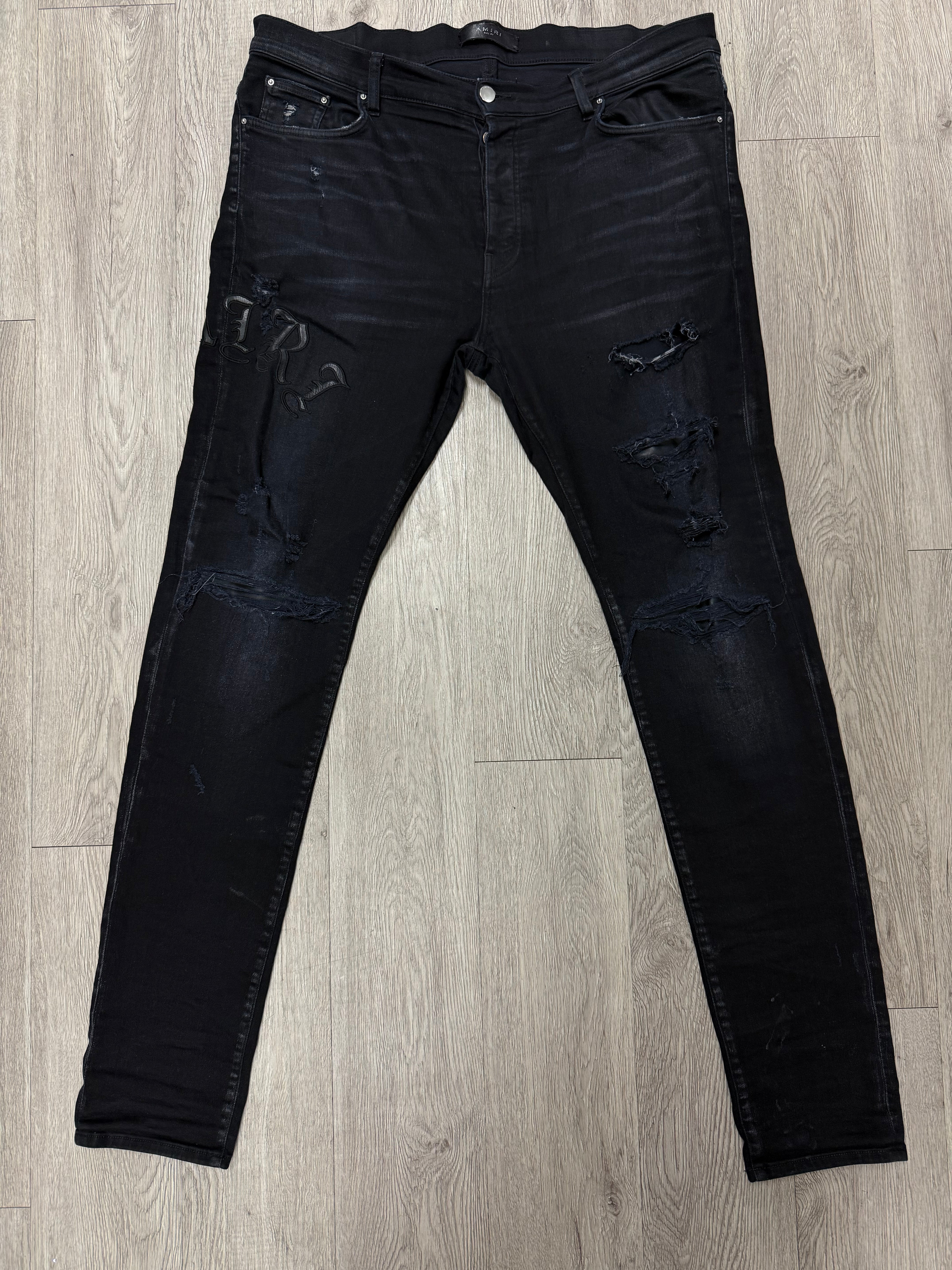 Amiri Black on Black English Side Logo Jeans