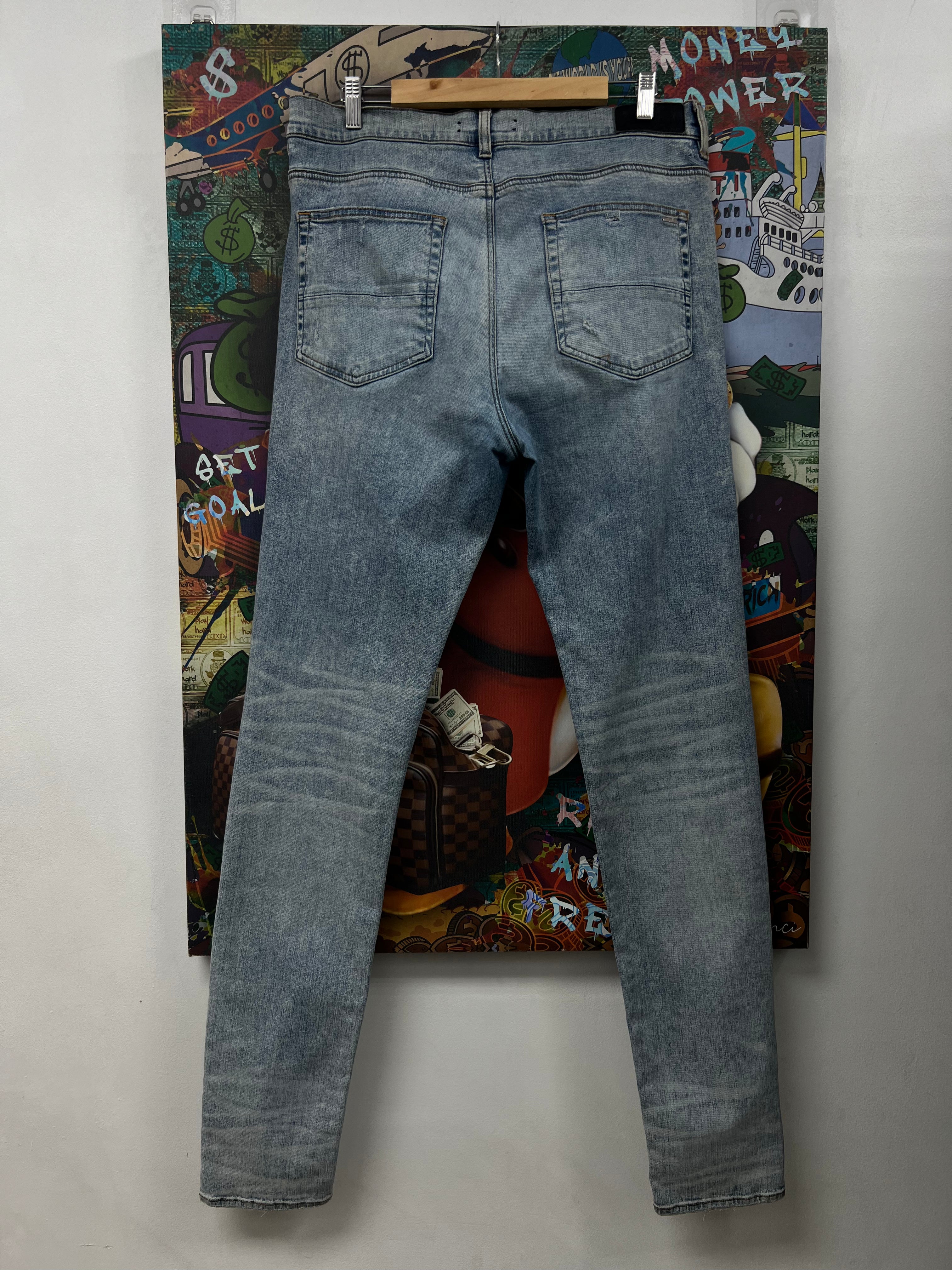 Amiri MX1 Light Wash Iridescent Patch Jeans