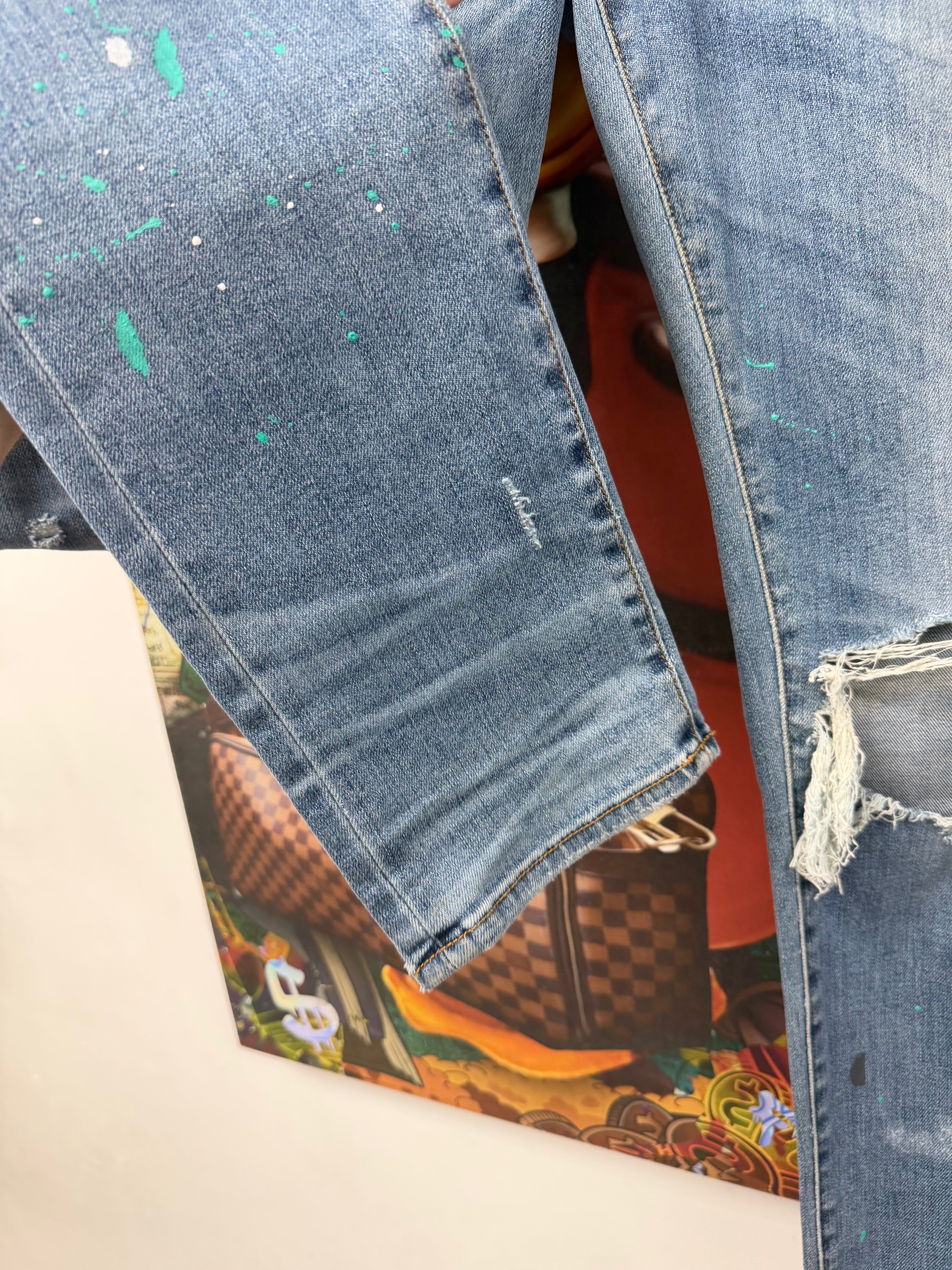 Amiri Light Wash Teal Splatter Ripped Jeans