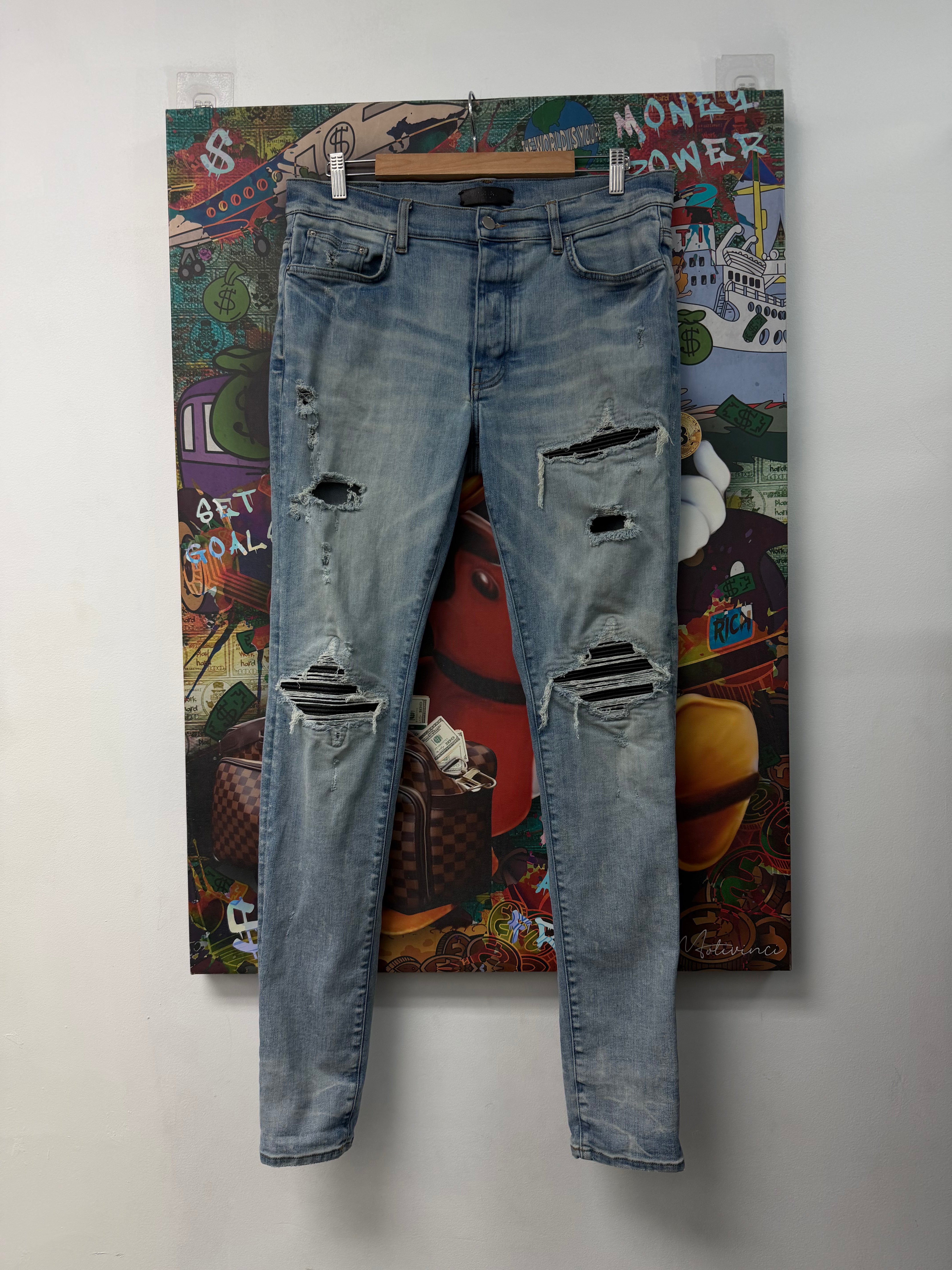 Amiri Light Wash Black Patch MX1 Jeans