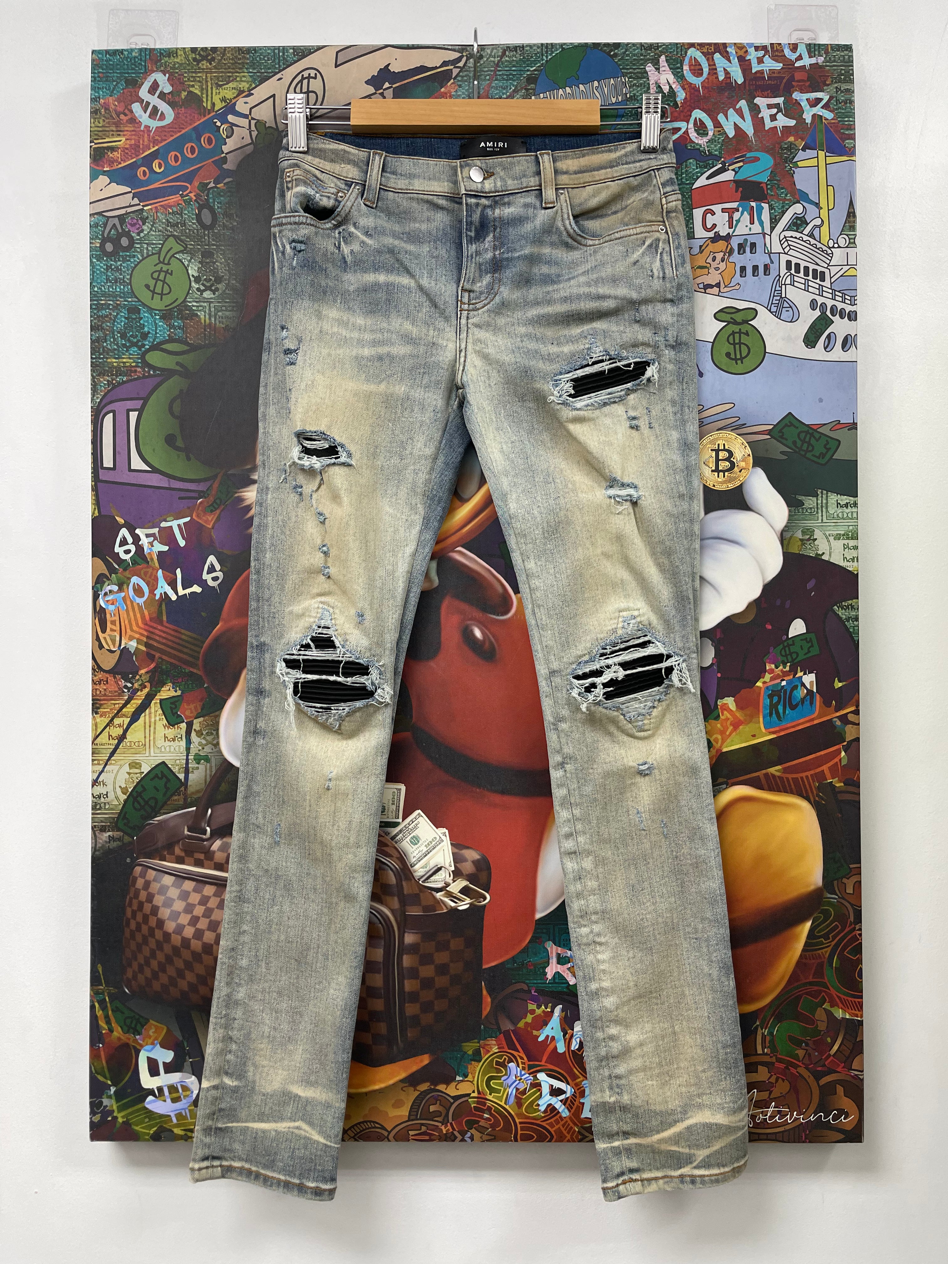 Amiri MX1 Light Wash Black Patch Jeans