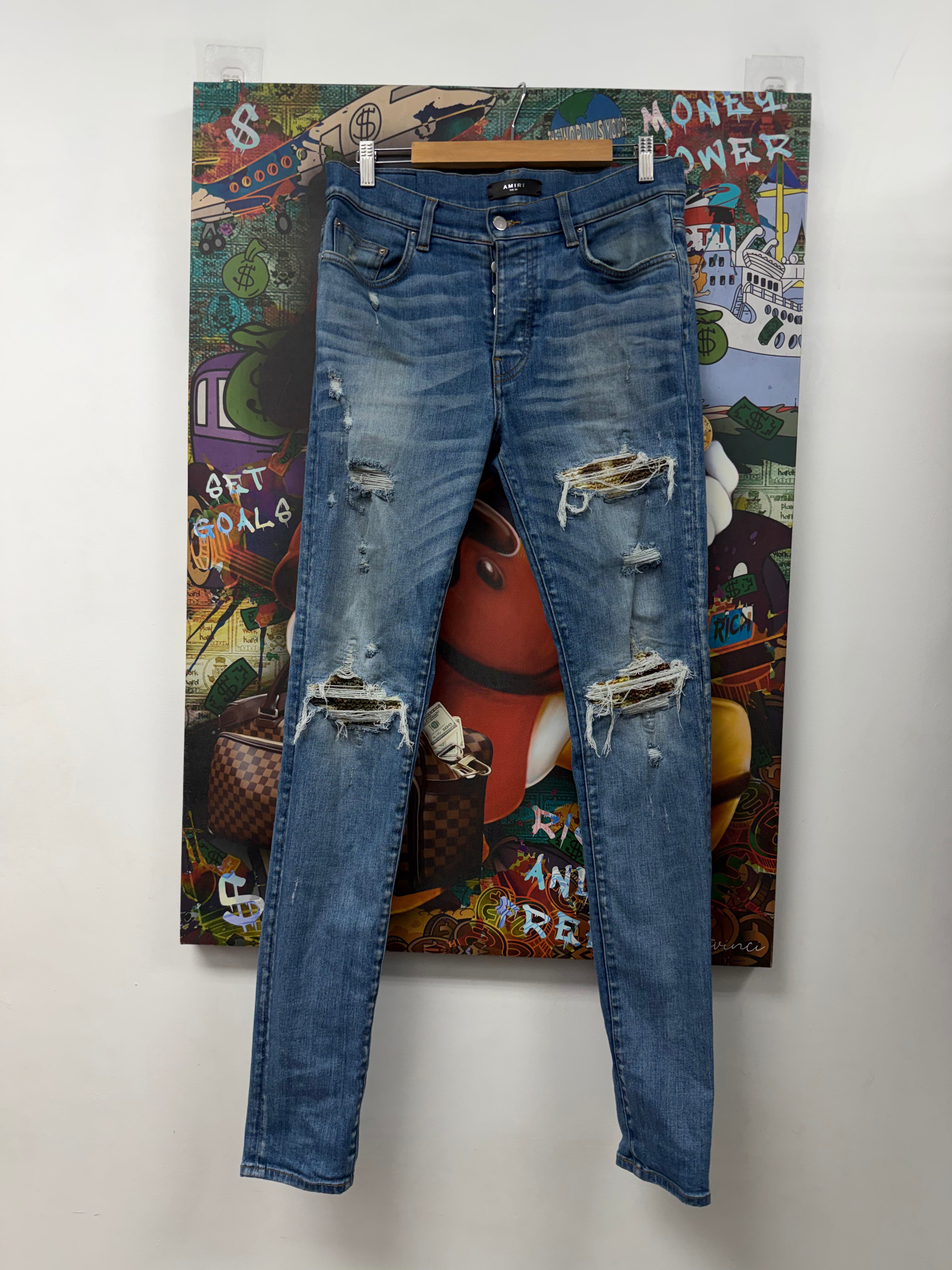 Amiri MX1 Light Wash Aloha Jeans