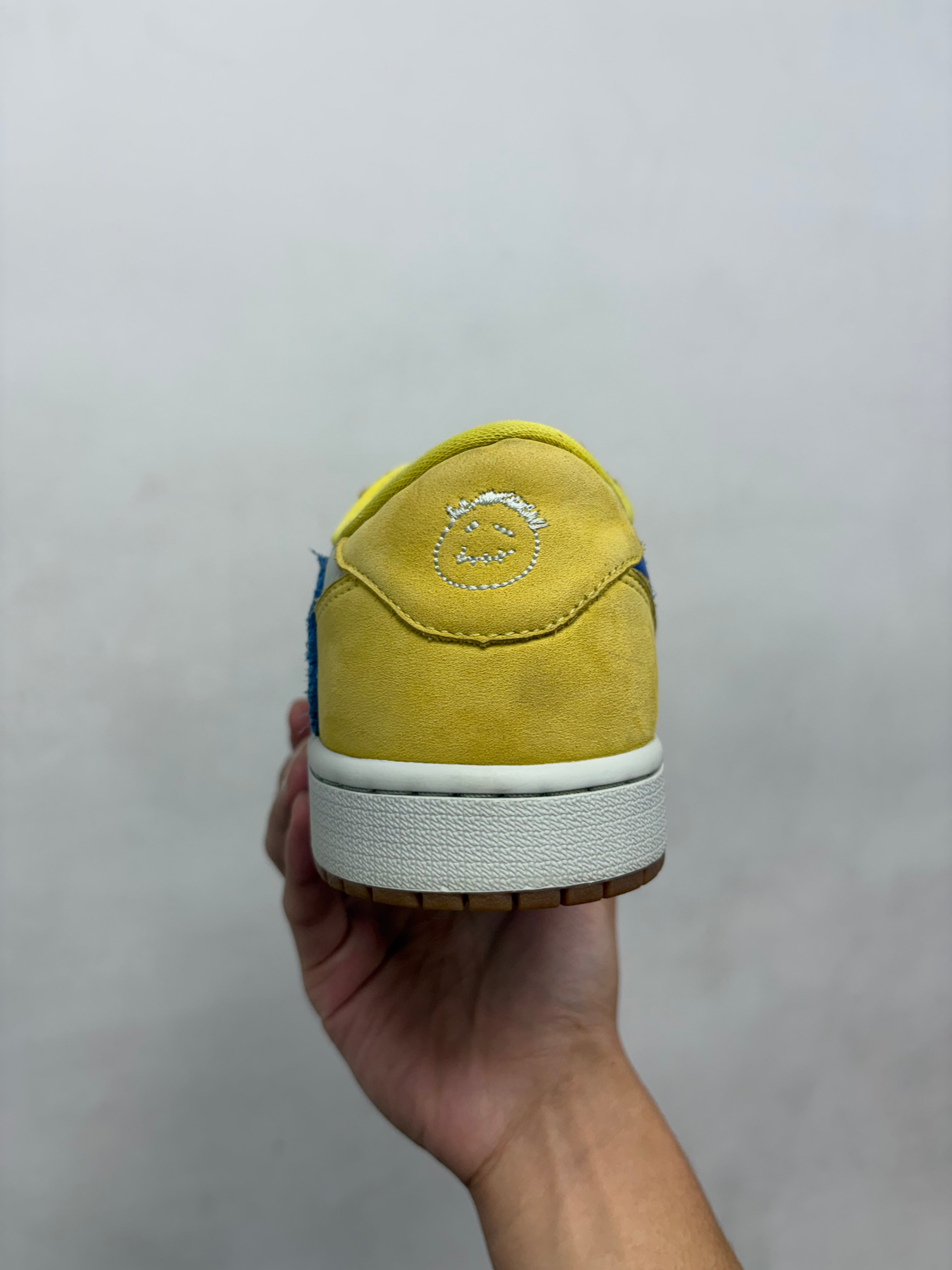 Jordan 1 Low Travis Scott Canary Yellow Sneakers