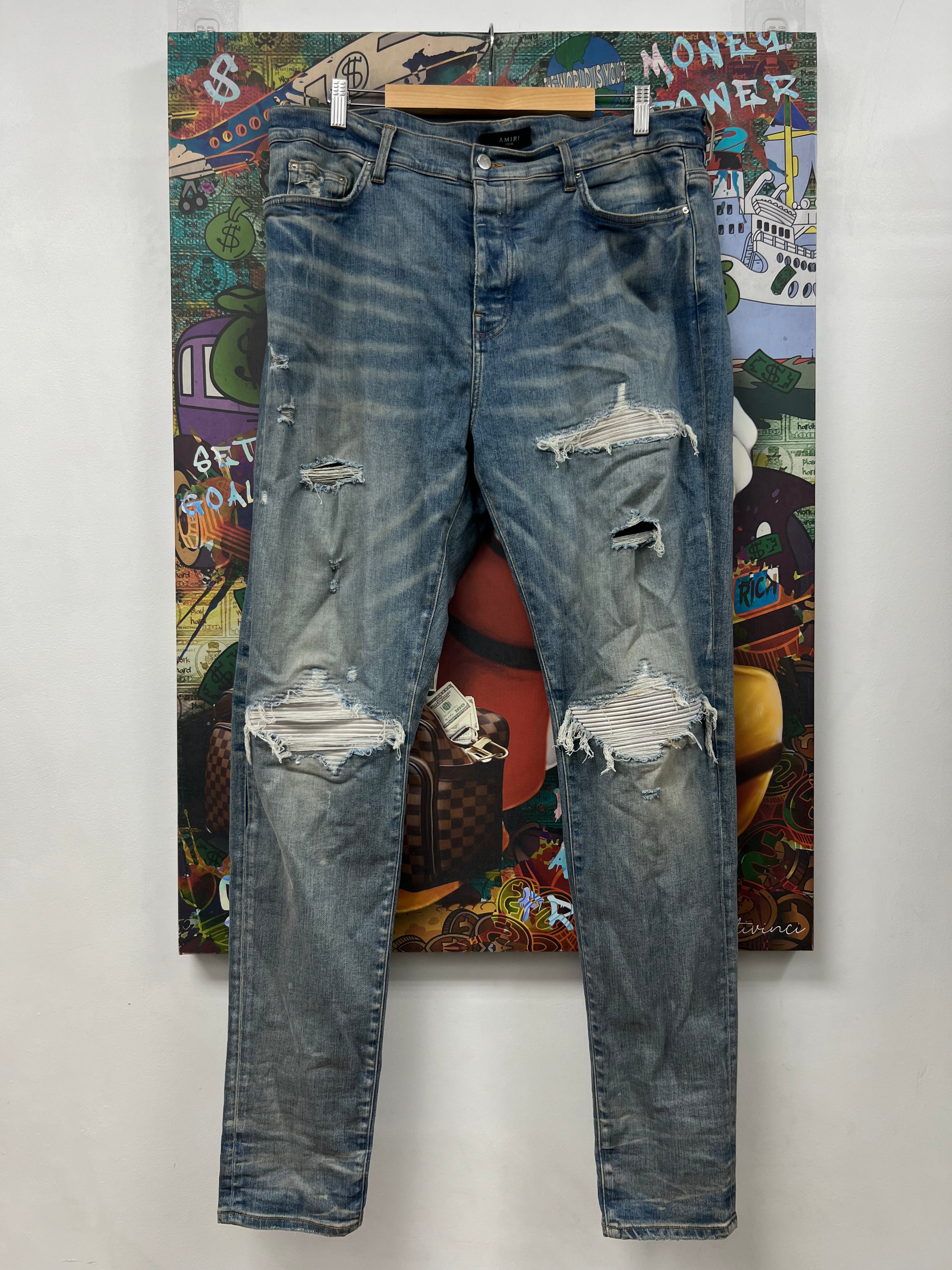 Amiri MX1 Light Wash White Patch Jeans