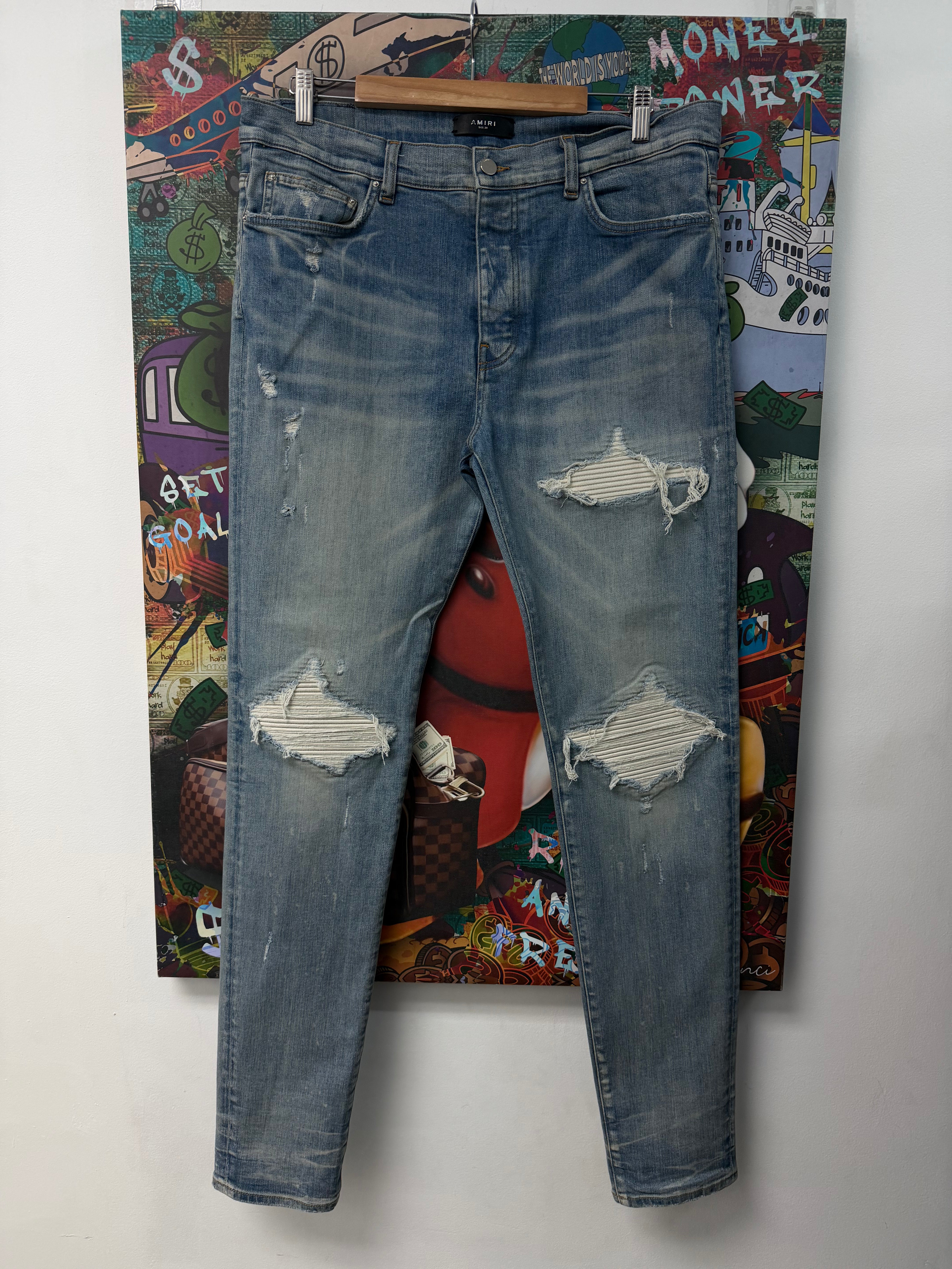 Amiri Light Wash White Patch MX1 Jeans