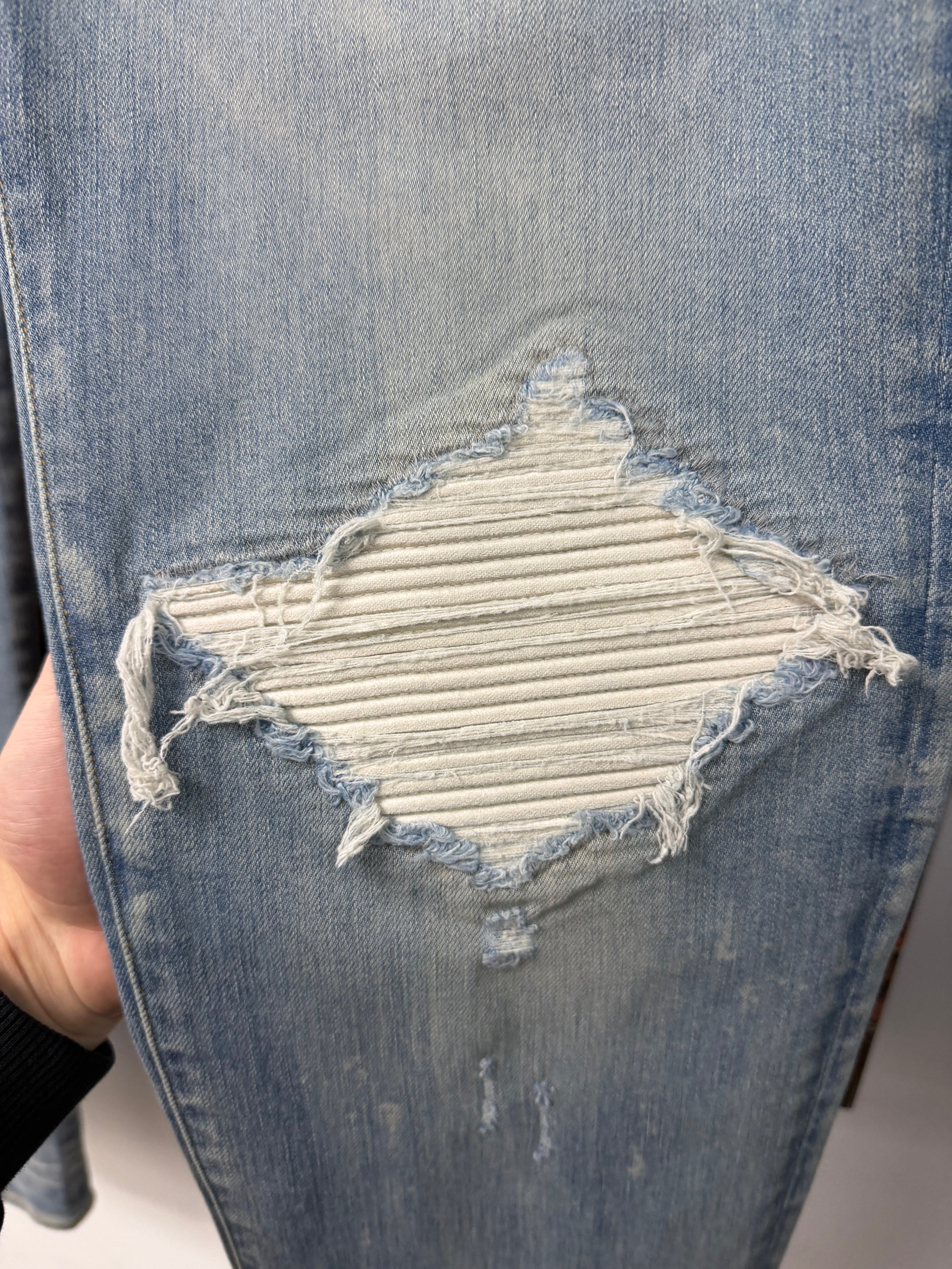 Amiri Light Wash White Patch MX1 Jeans