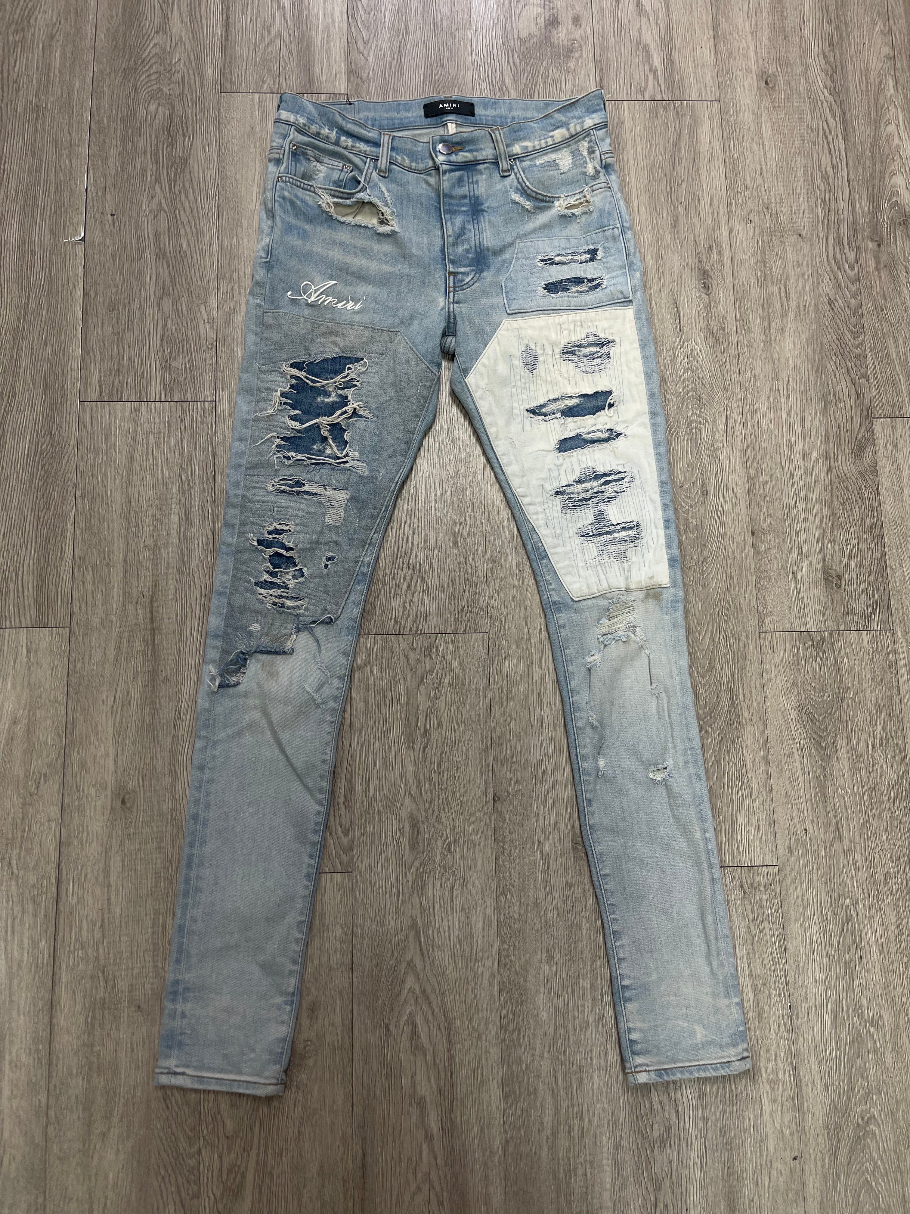 Amiri Light Wash Double Knee Distressed Jeans