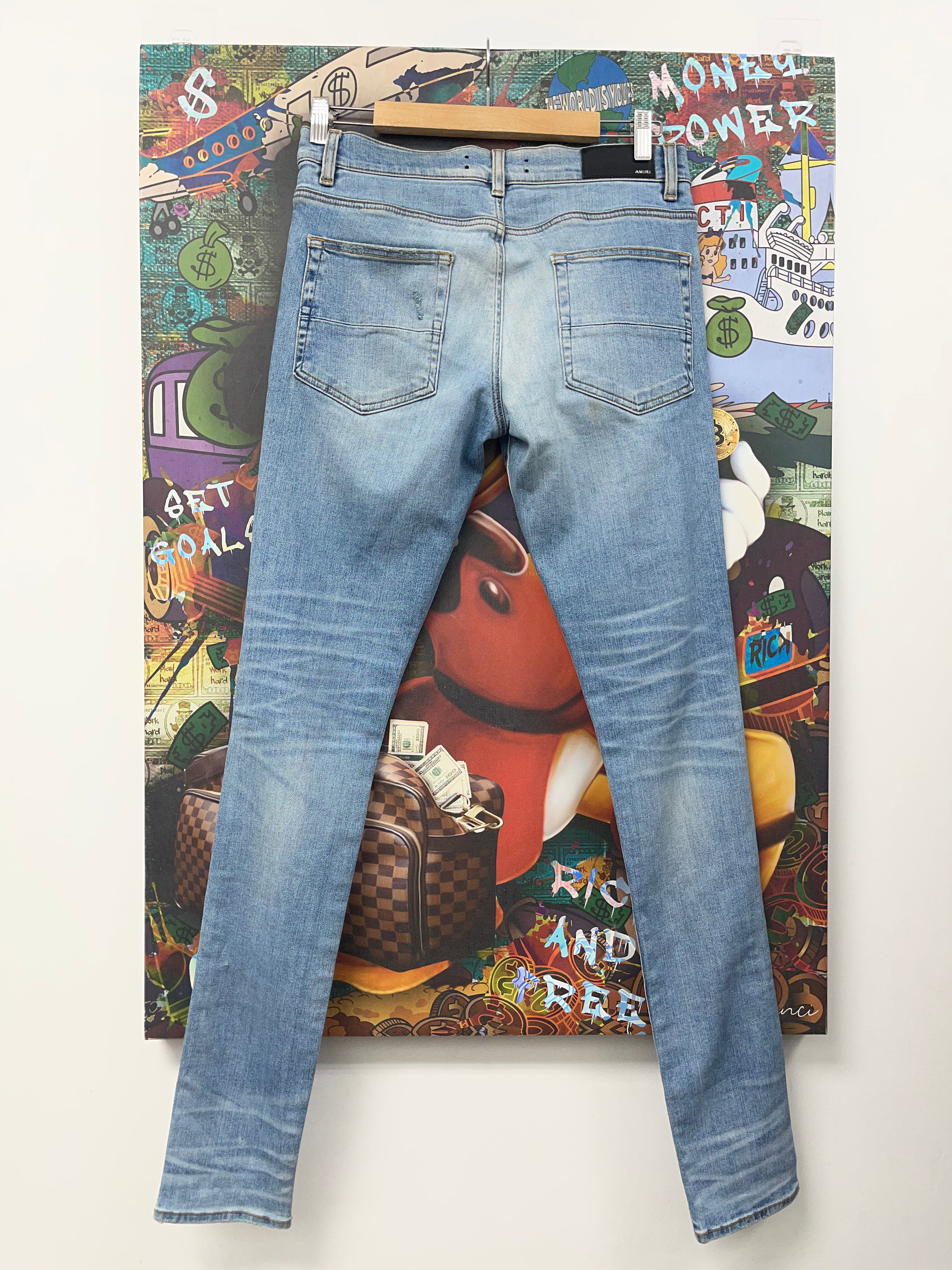 Amiri Light Wash Knee Rip (Zipper) Jeans