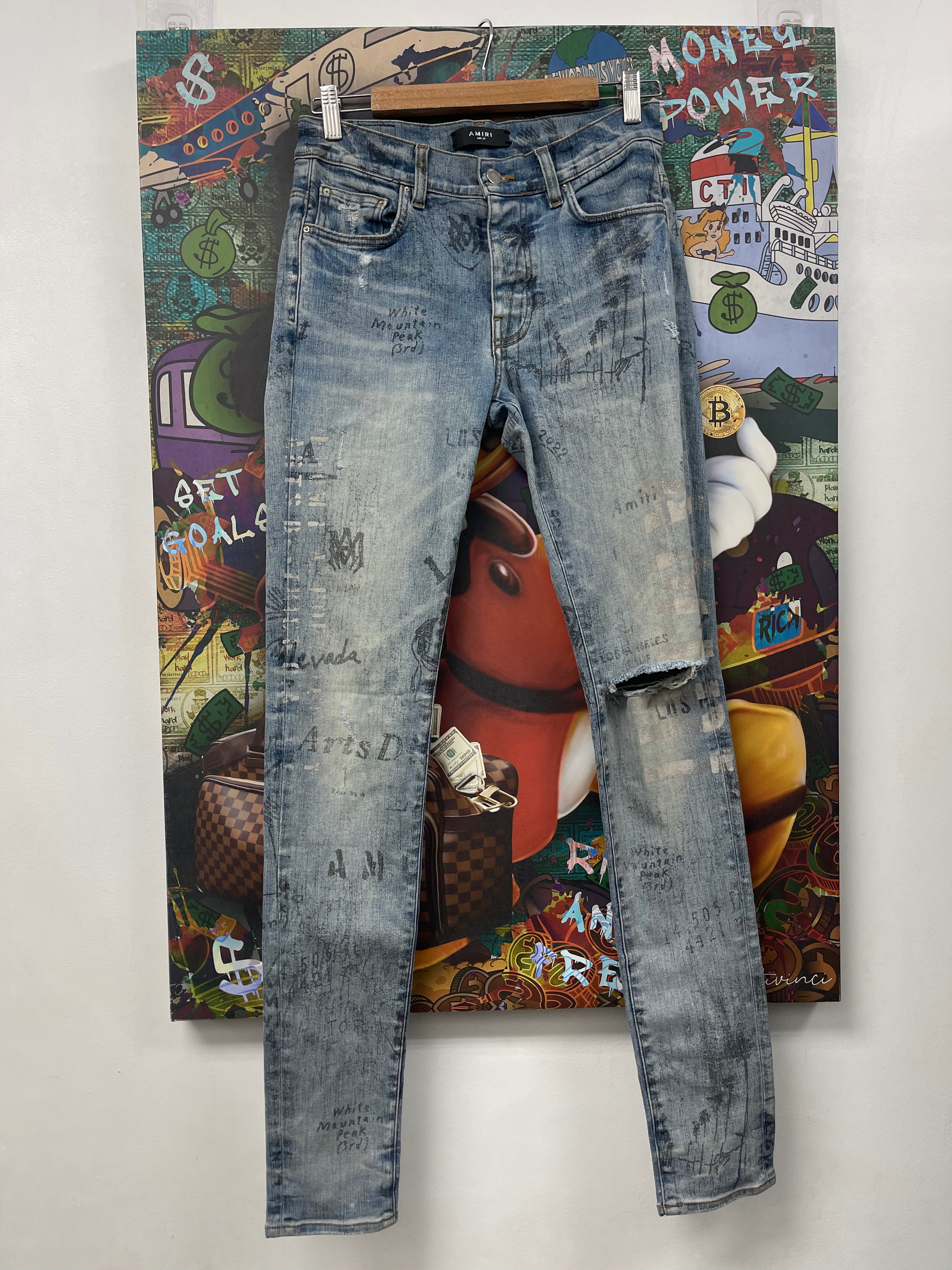 Amiri Light Wash Stencil Jeans