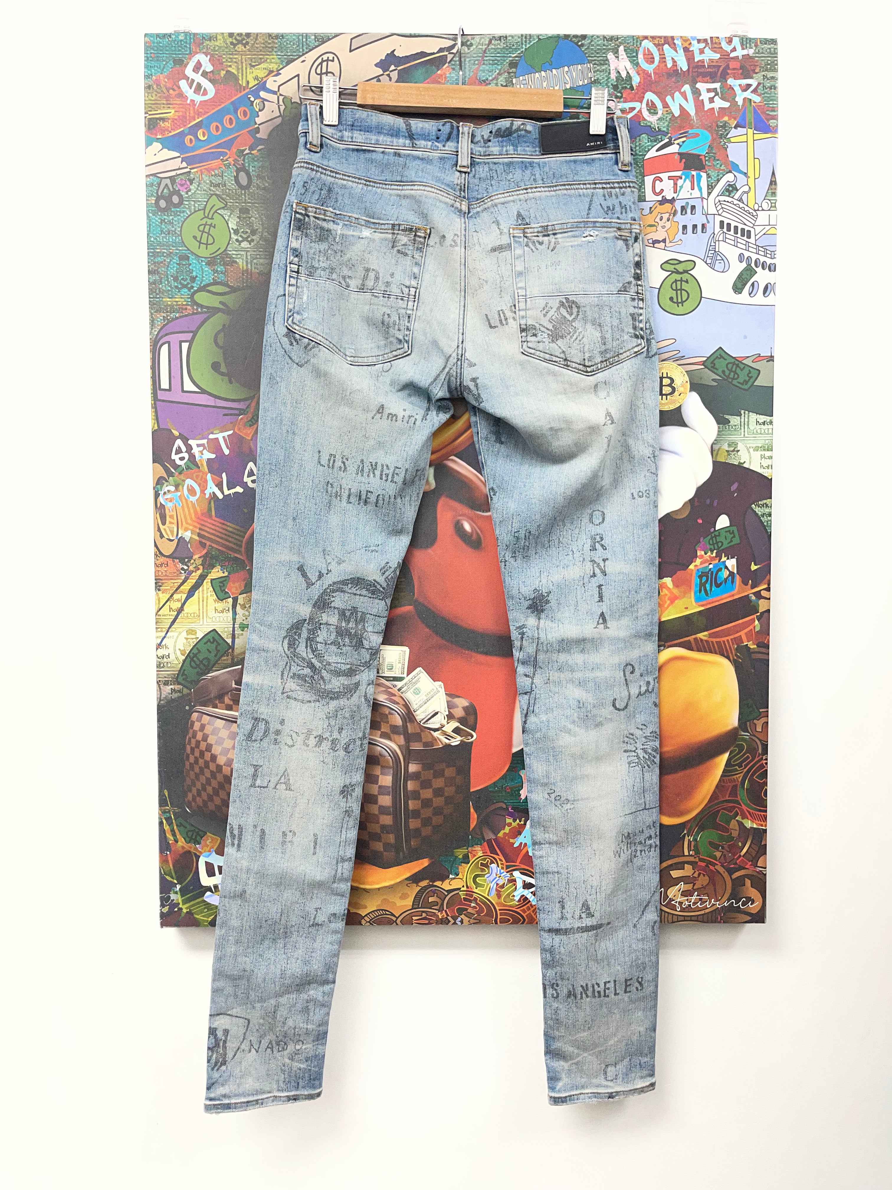 Amiri Light Wash Stencil Jeans