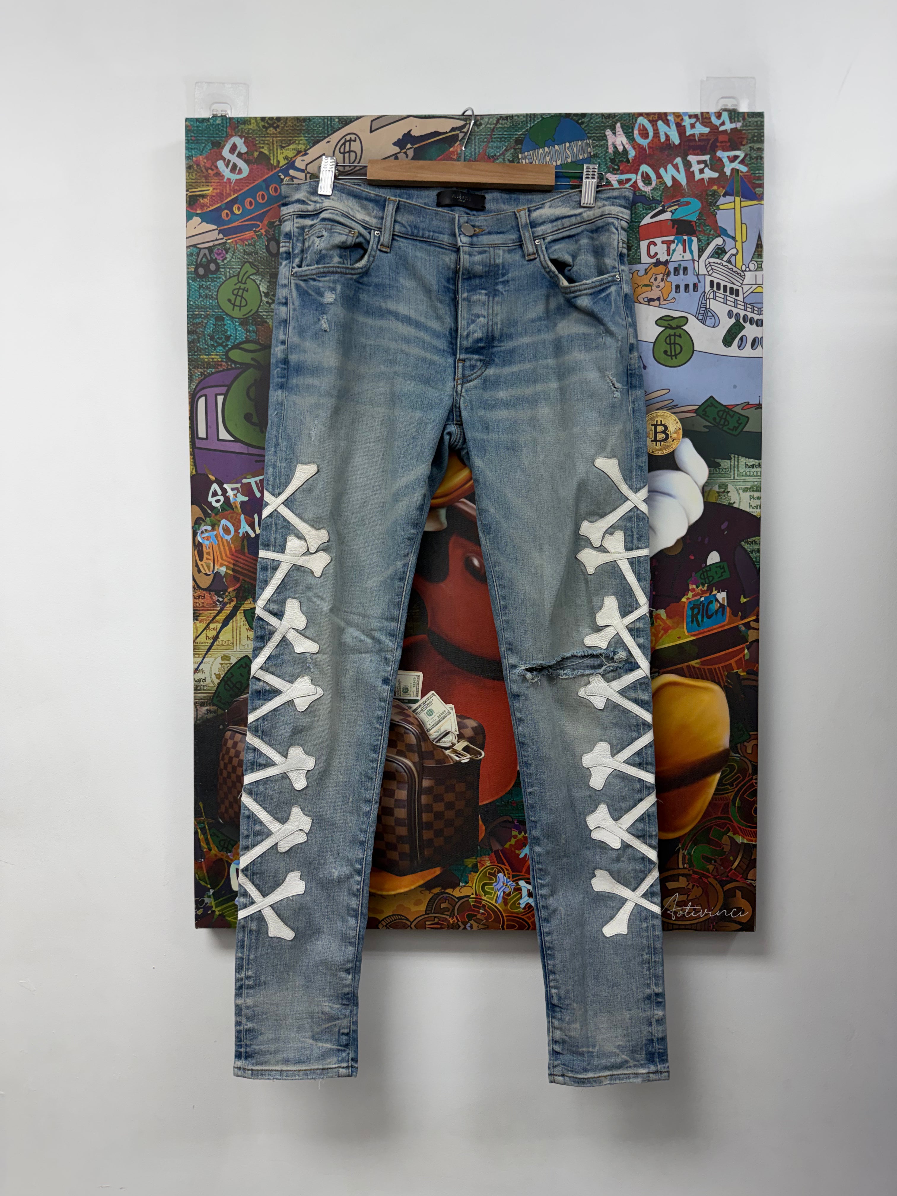 Amiri Light Wash White Bones Jeans