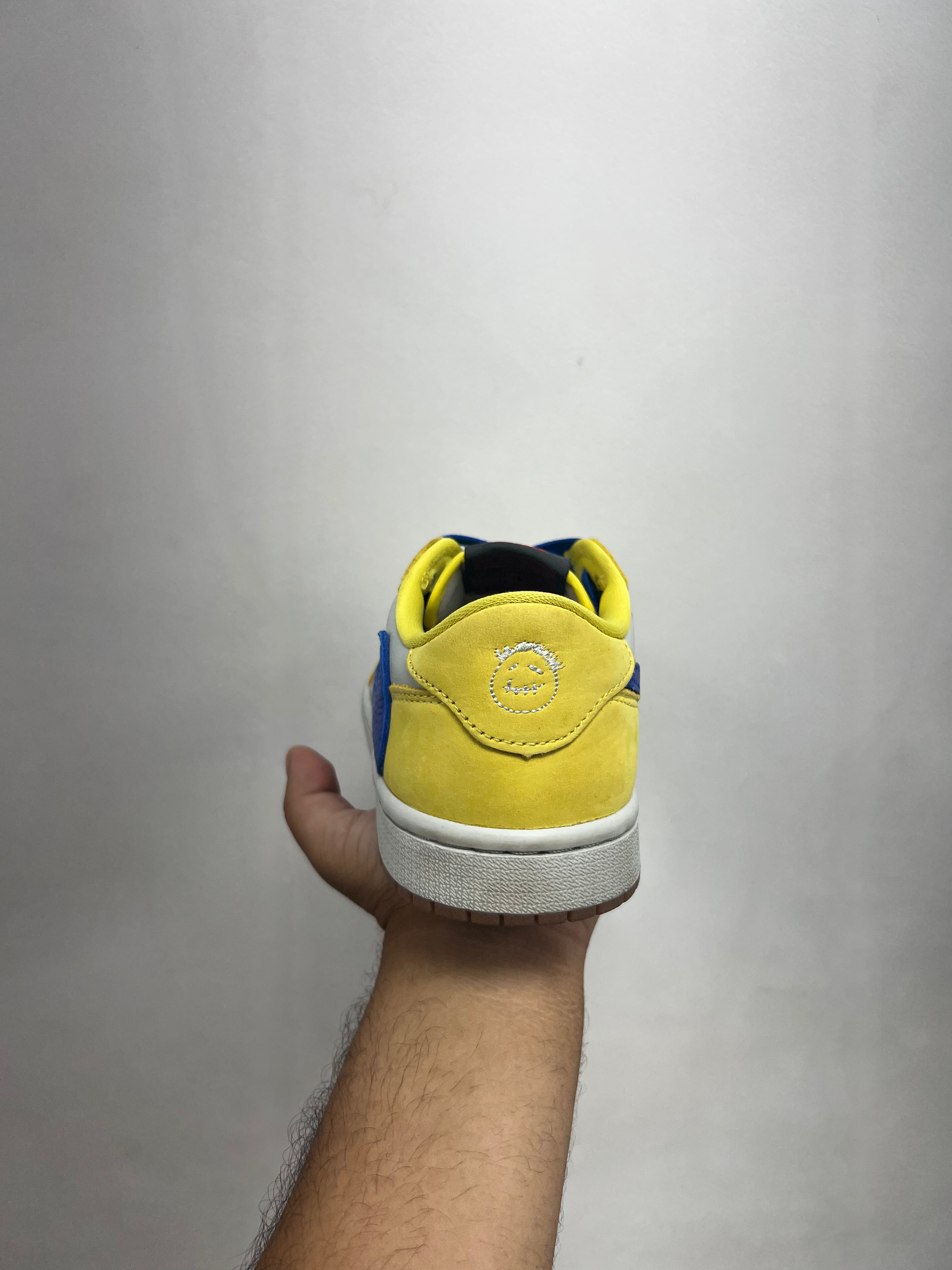 Jordan 1 Low Travis Scott Canary Sneakers
