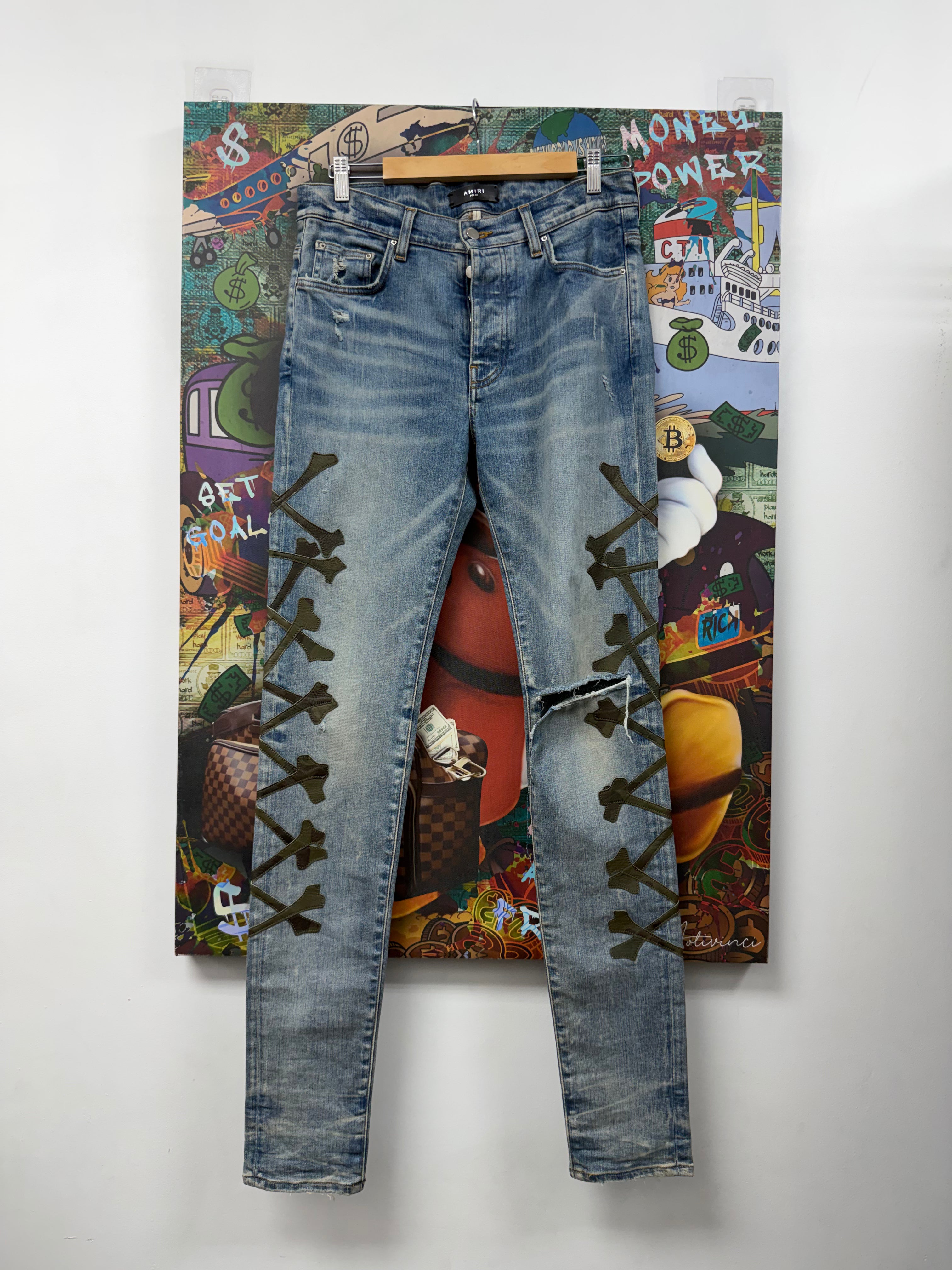 Amiri Light Wash Camo Bones Jeans