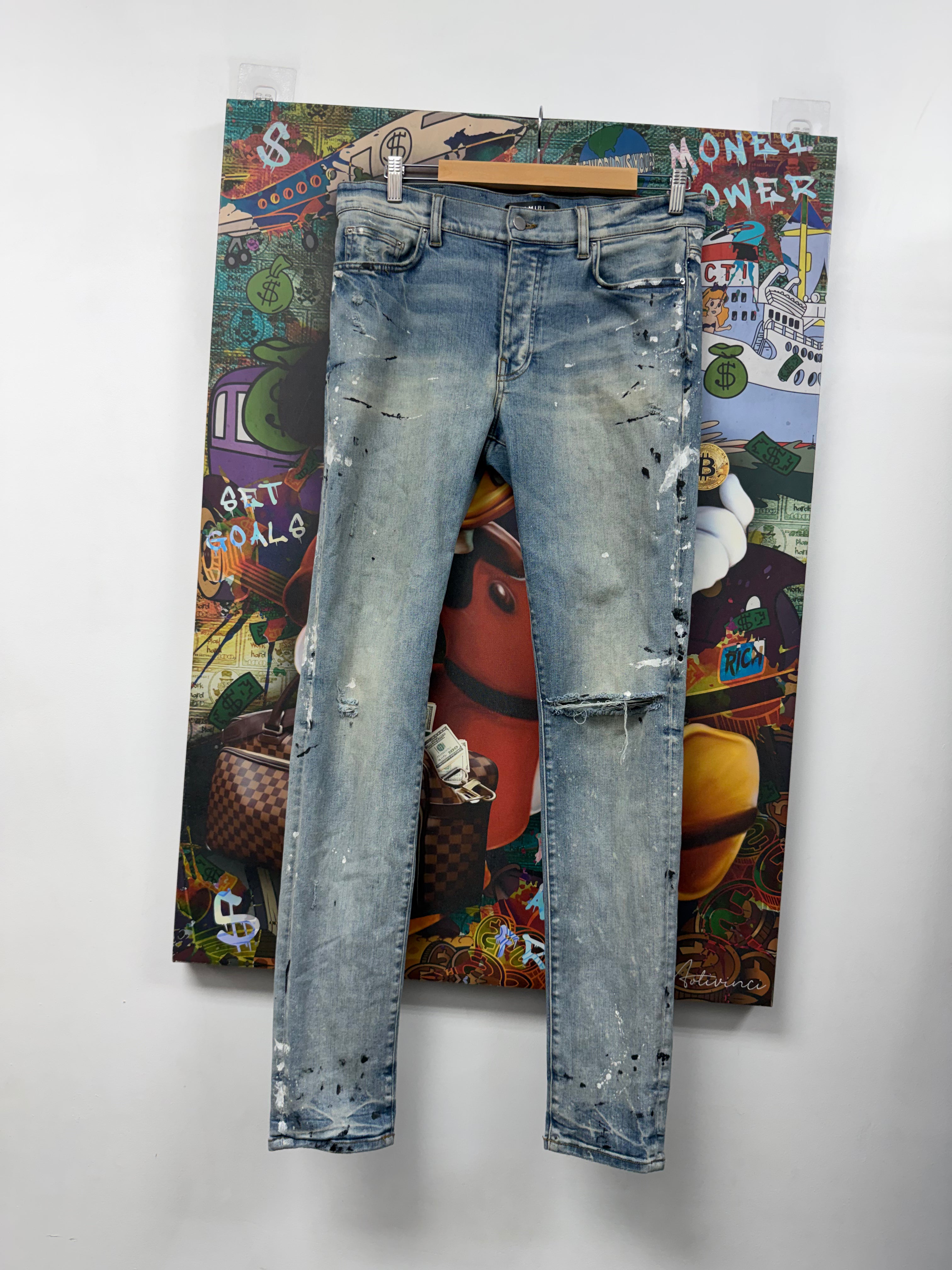 Amiri Light Wash Paint Splatter Jeans