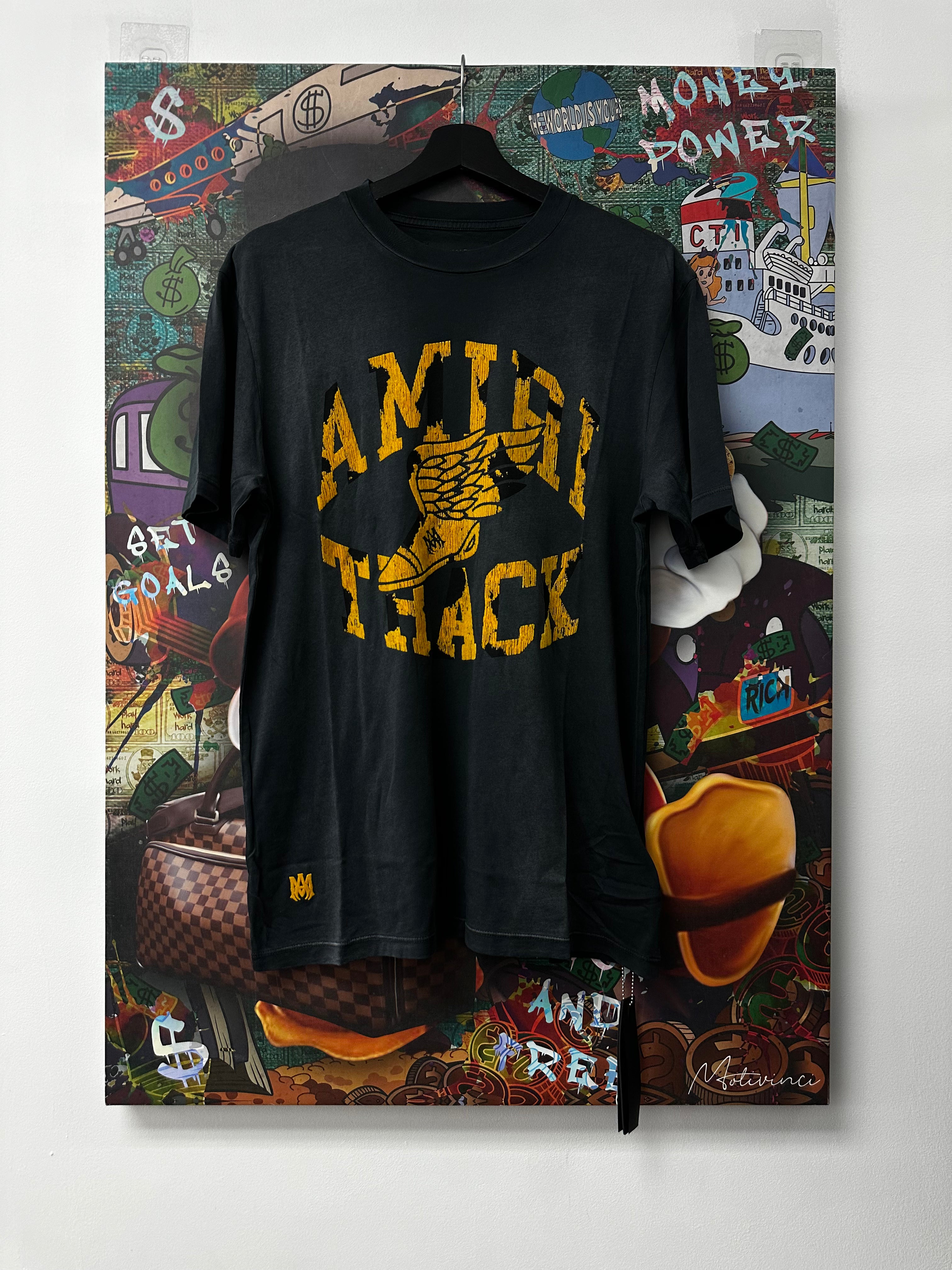 Amiri Faded Black Yellow Track Logo Tee