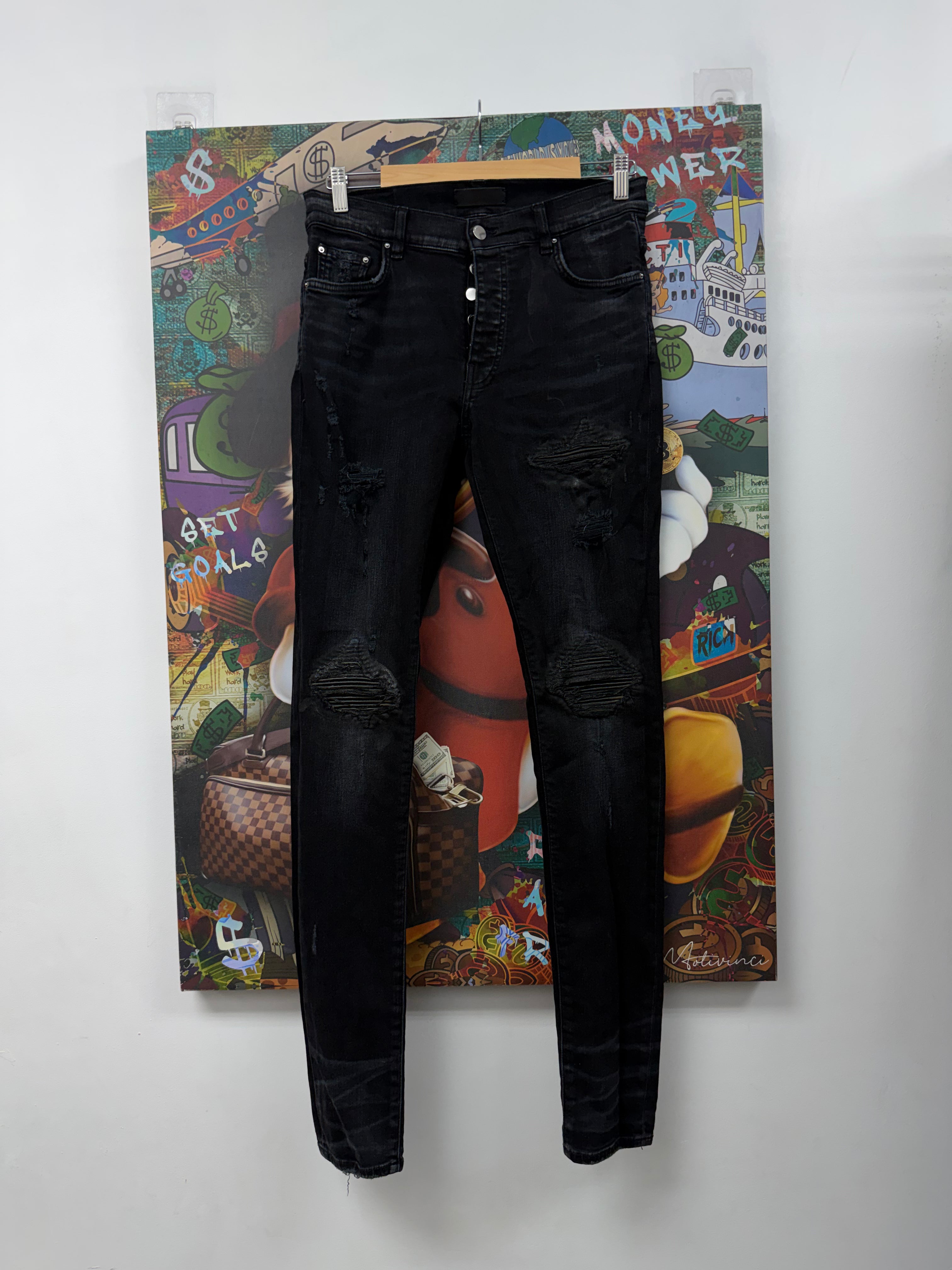 Amiri MX1 Light Wash Black Leather Patch Jeans