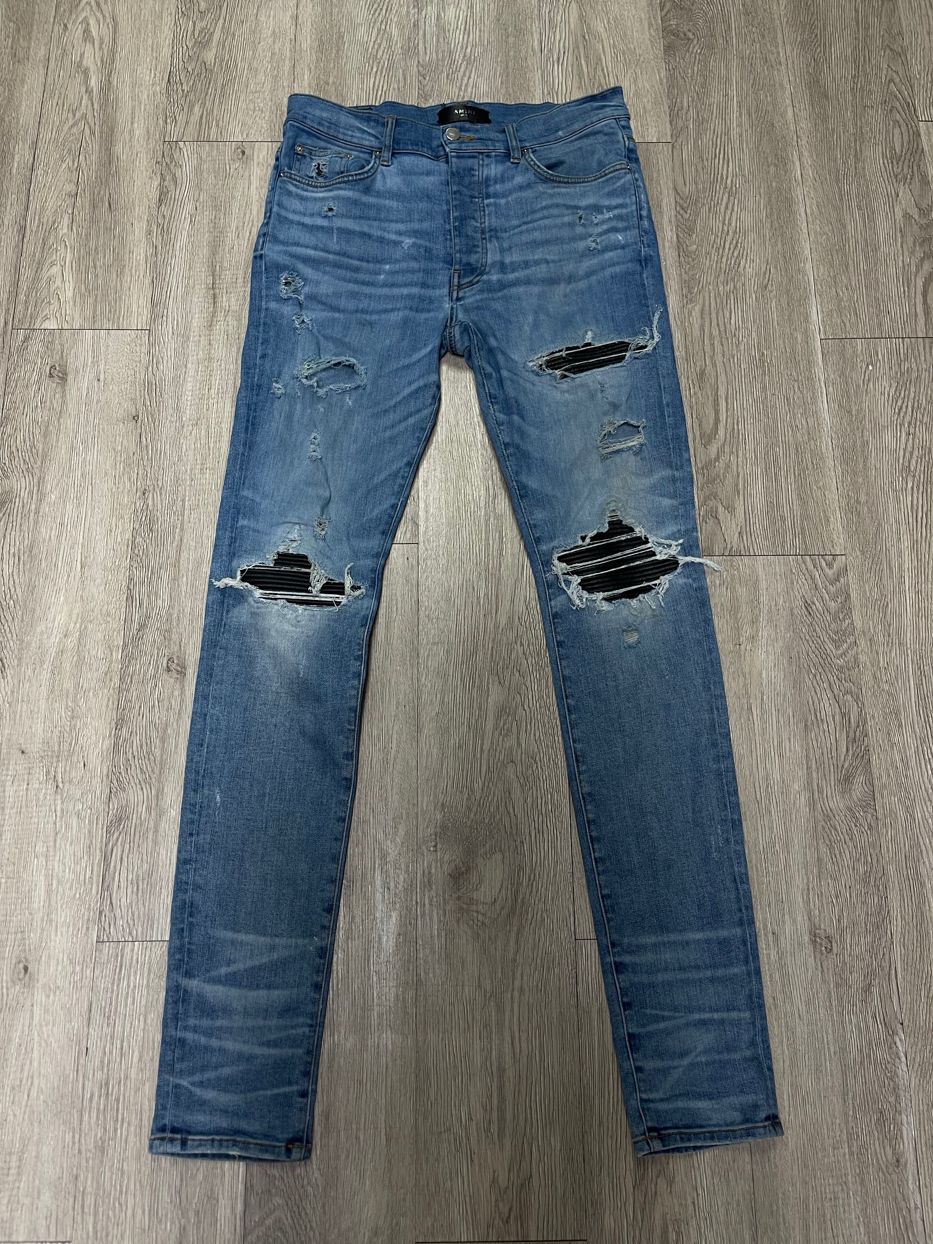Amiri MX1 Light Indigo Black Patch Jeans