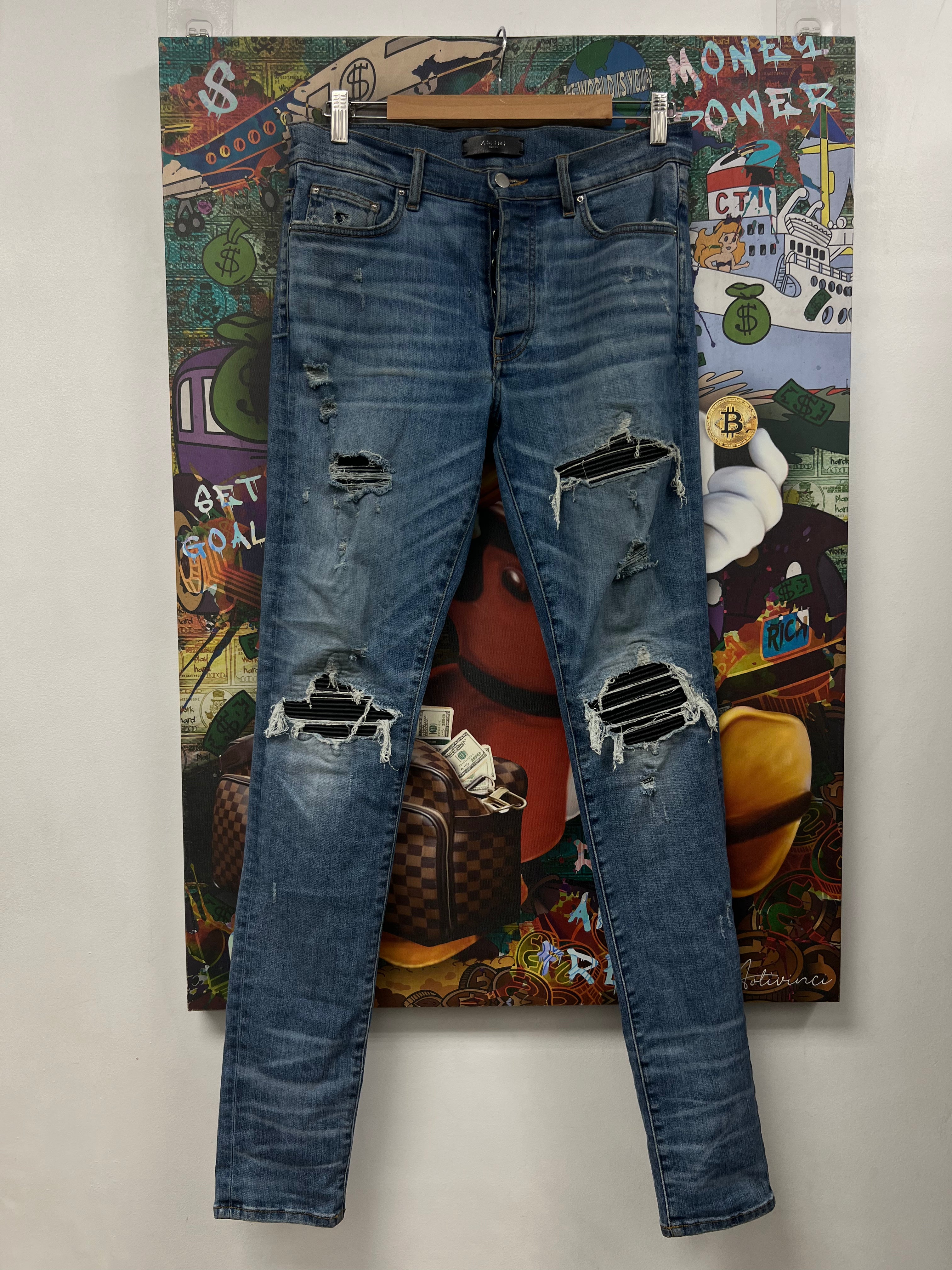 Amiri MX1 Light Wash Black Patch Jeans