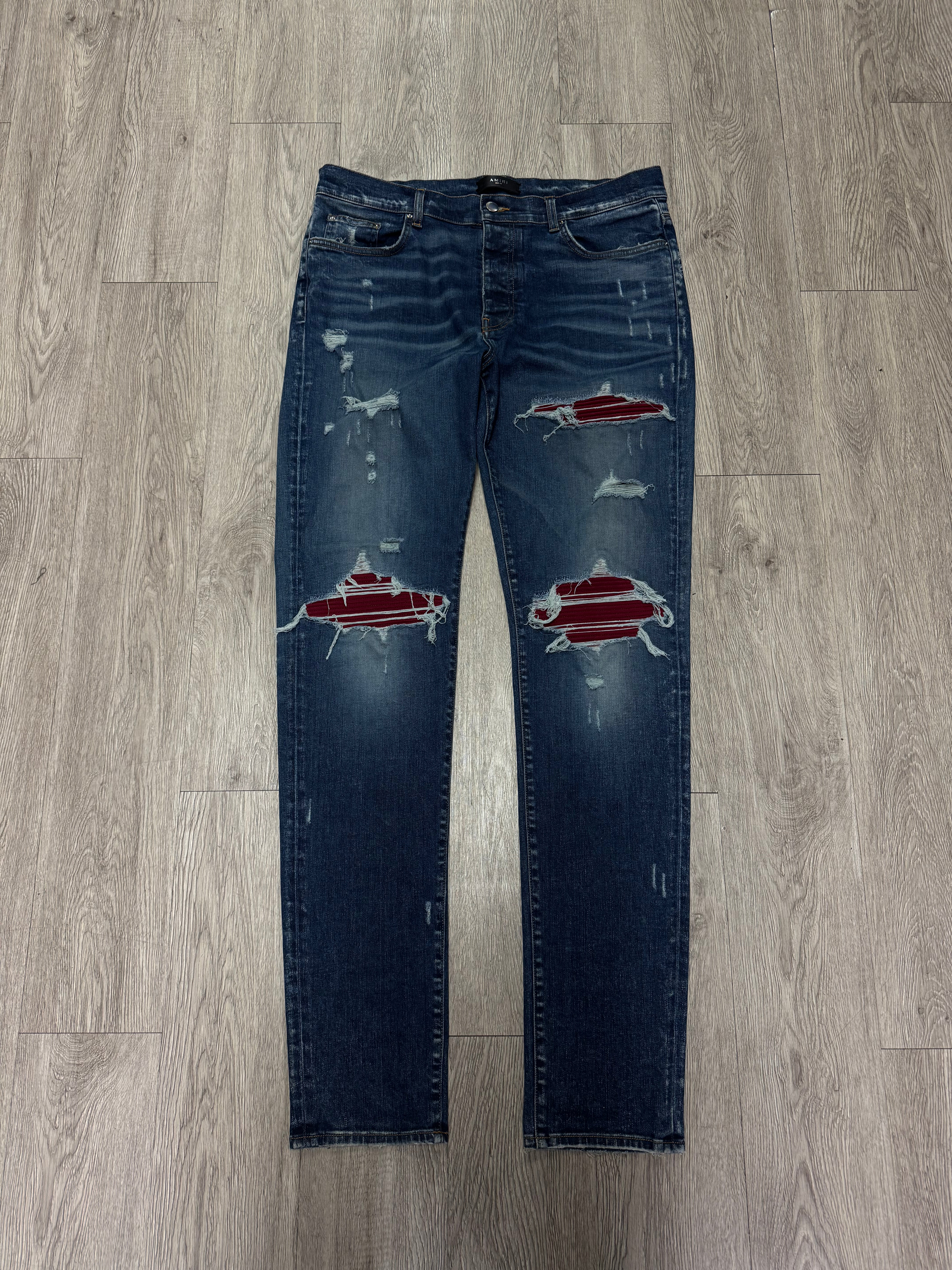Amiri MX1 Dark Wash Burgundy Patch Jeans