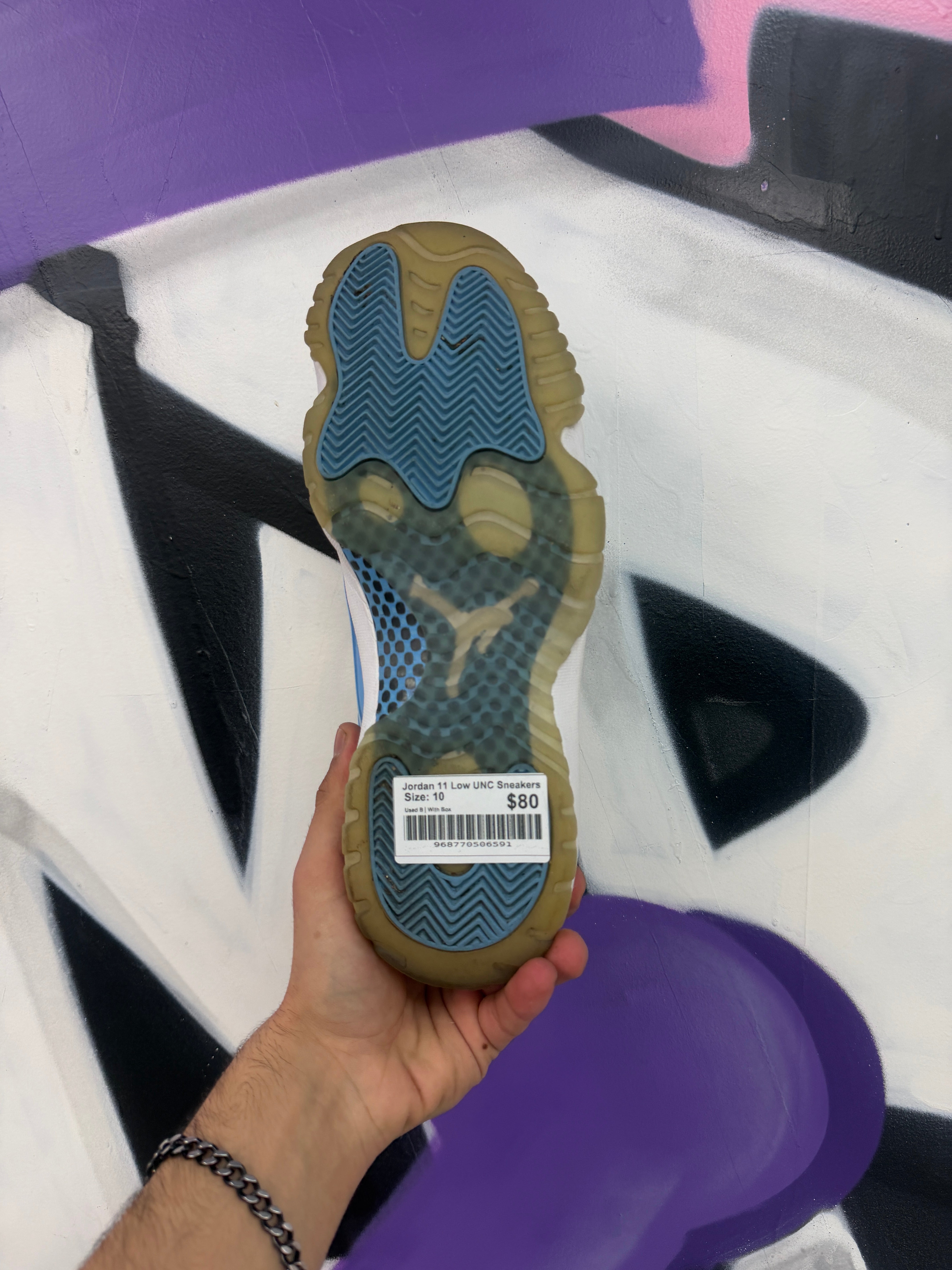 Jordan 11 Low UNC Sneakers