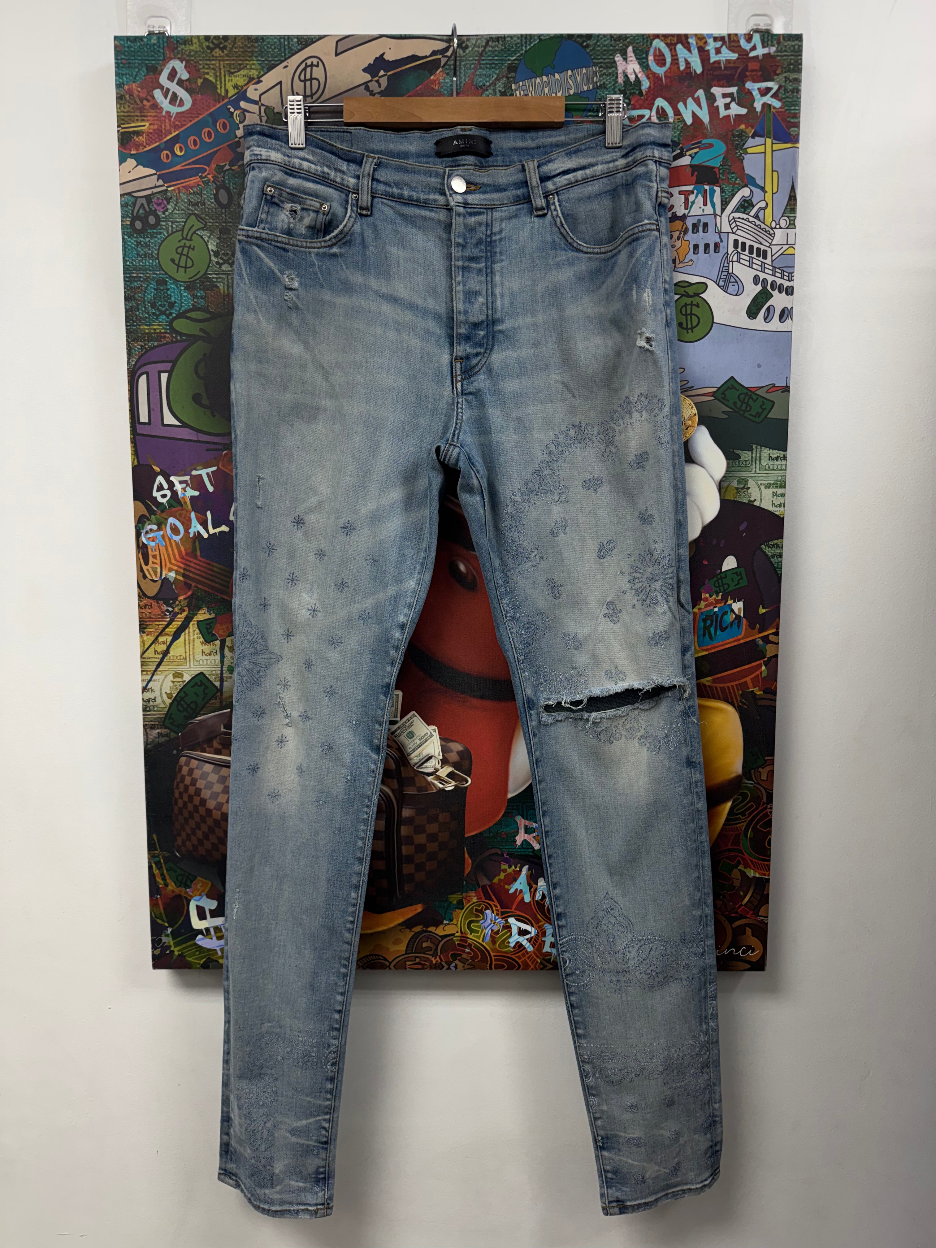 Amiri Light Wash Paisley Monogram Ripped Jeans