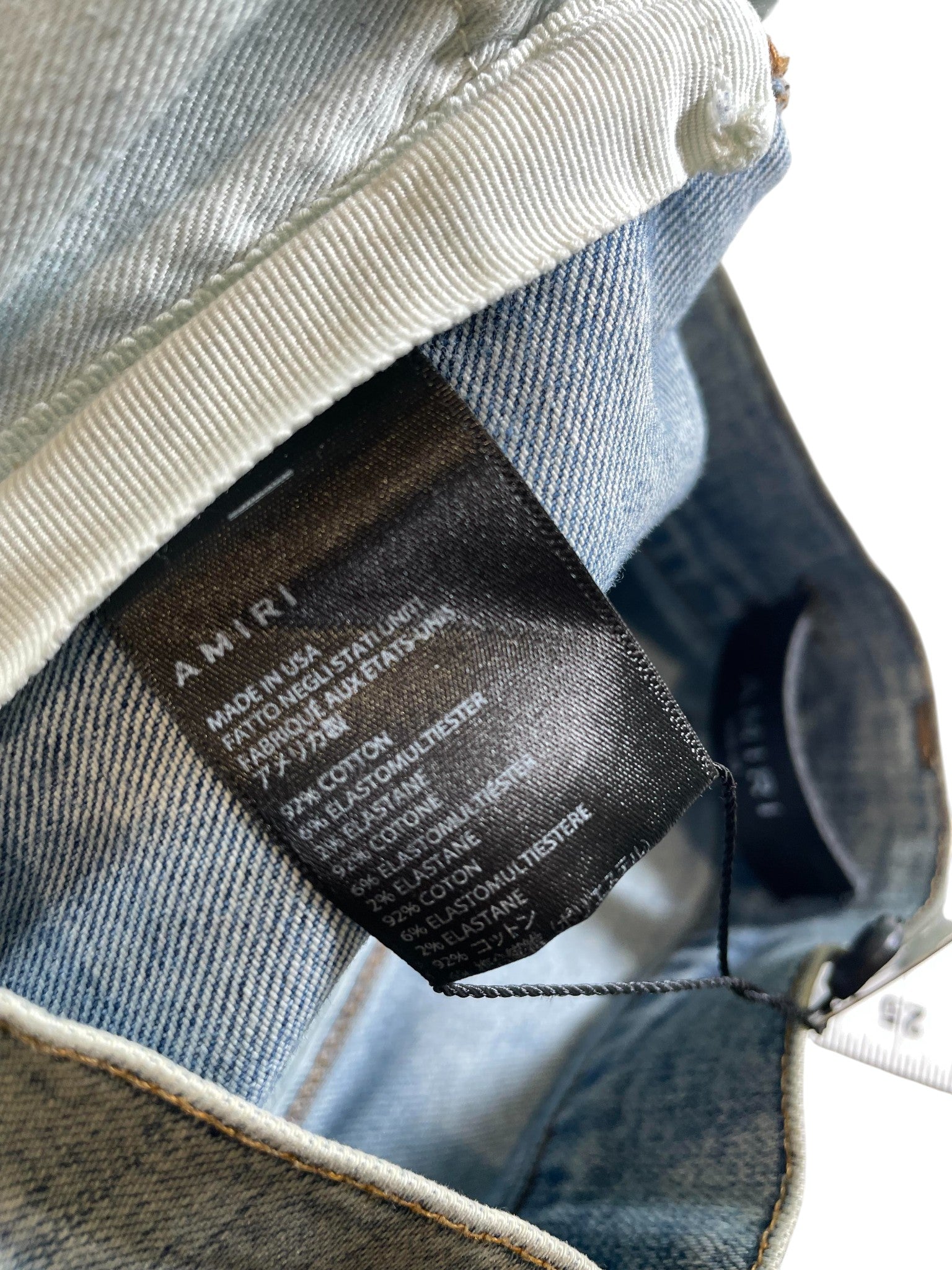 Amiri MX1 Paint Splatter Light Wash Jeans