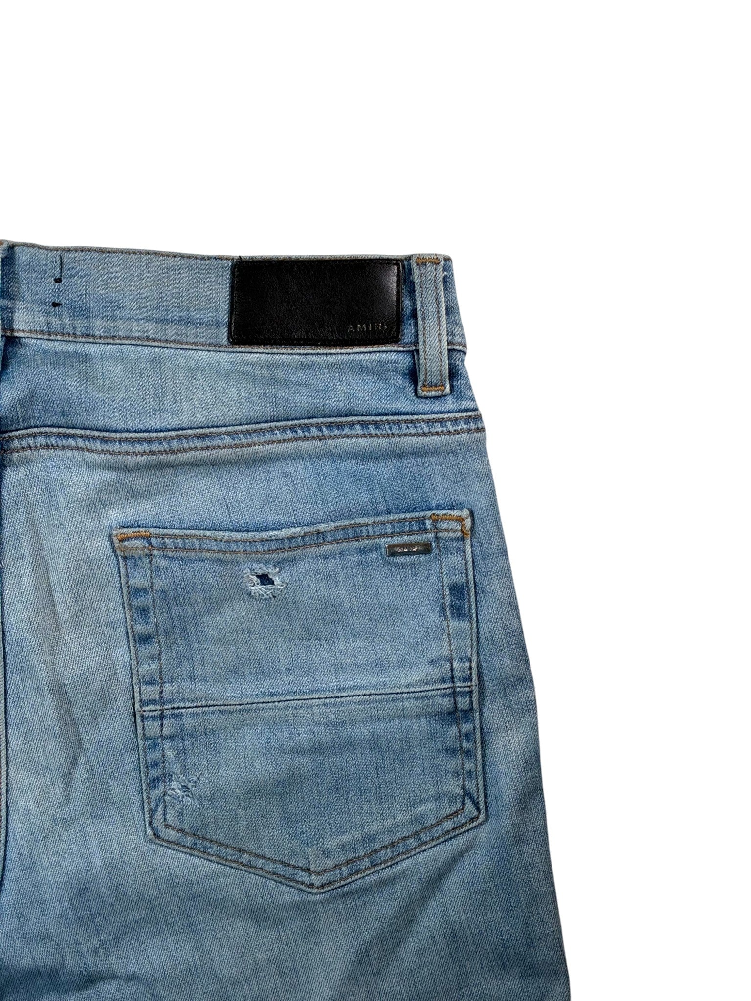 Amiri Light Wash Ripped Jeans