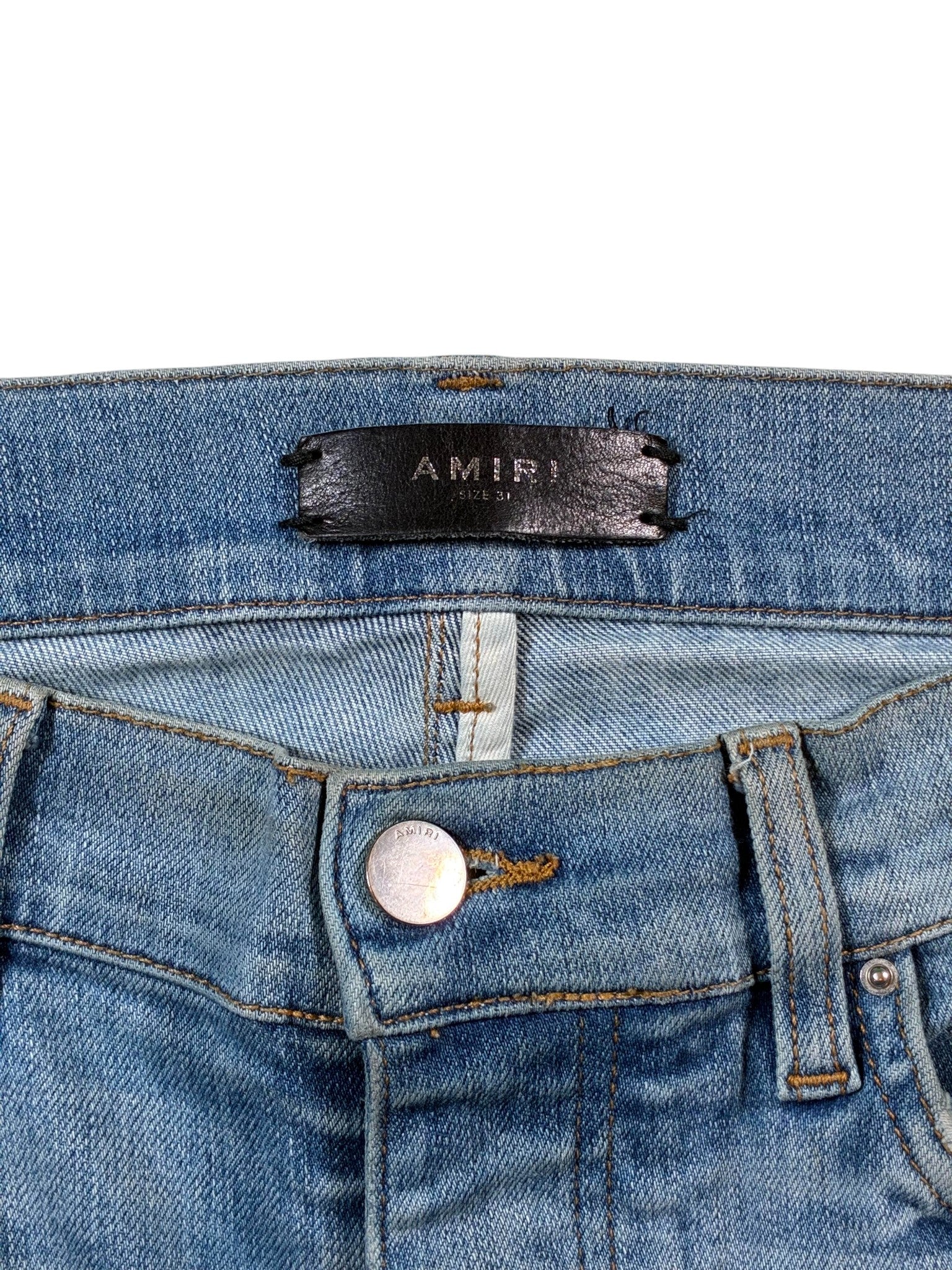 Amiri Light Wash Ripped Jeans
