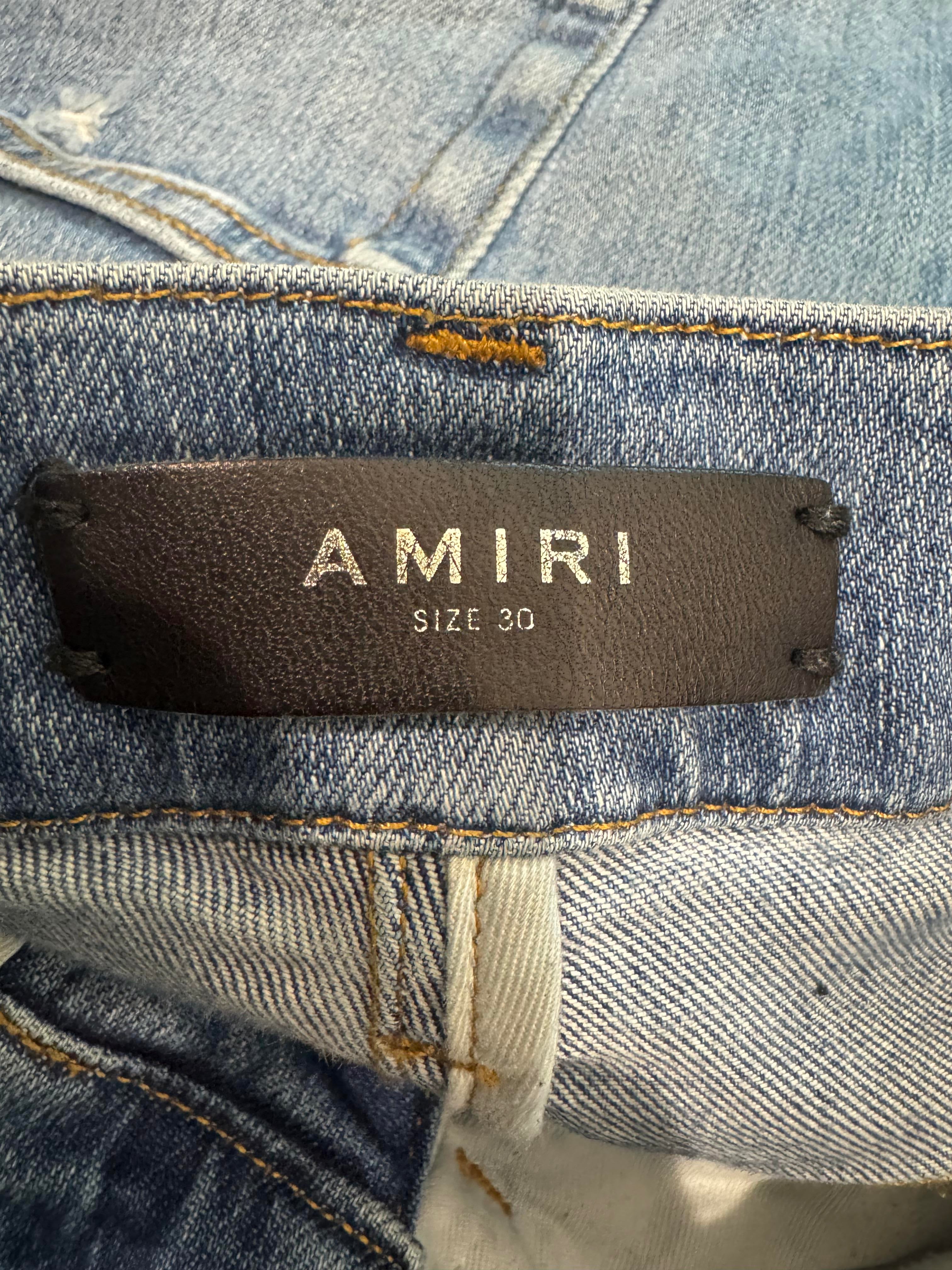 Amiri Knee Rip Light Wash Blue Jeans
