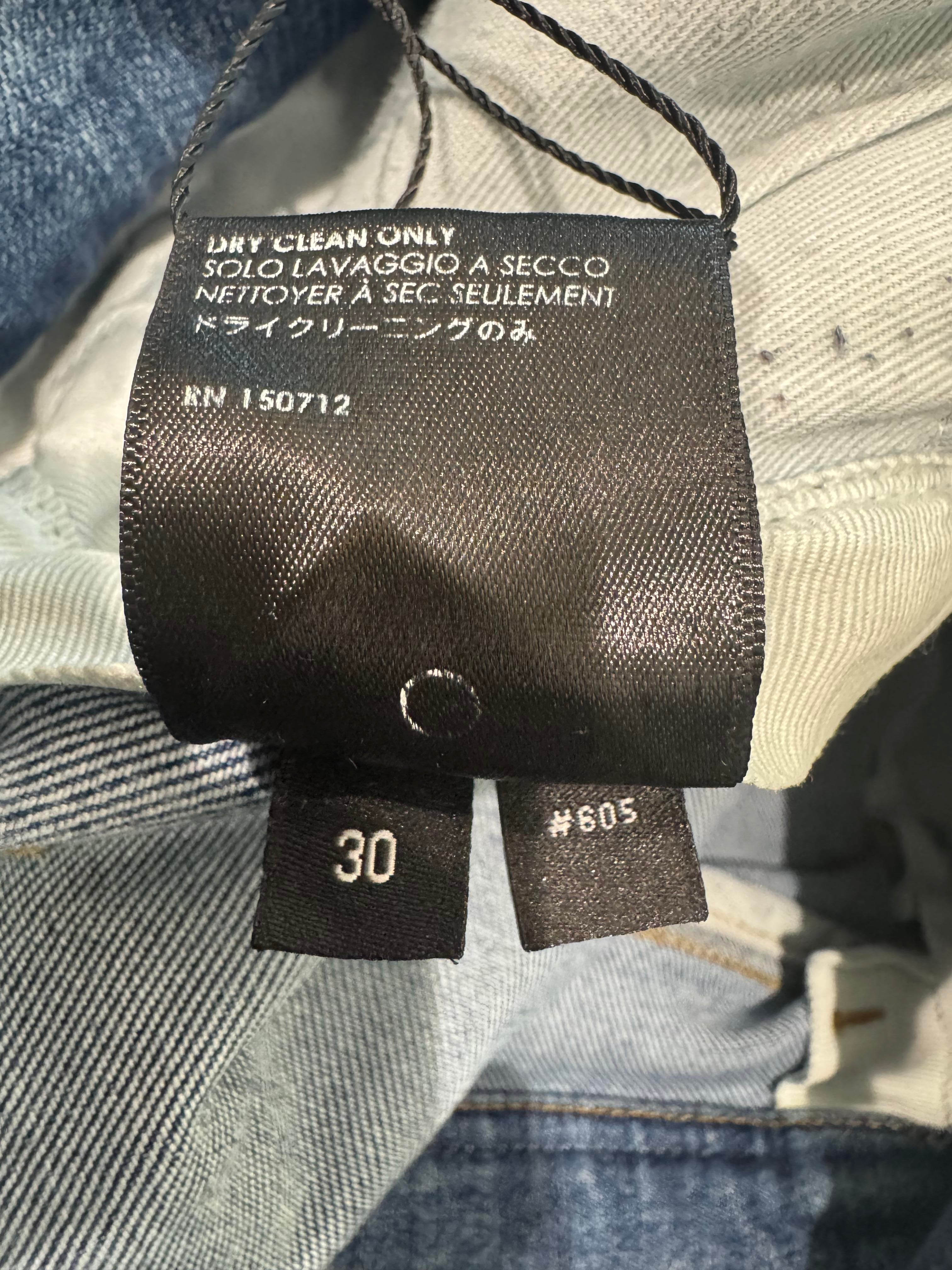 Amiri Knee Rip Light Wash Blue Jeans