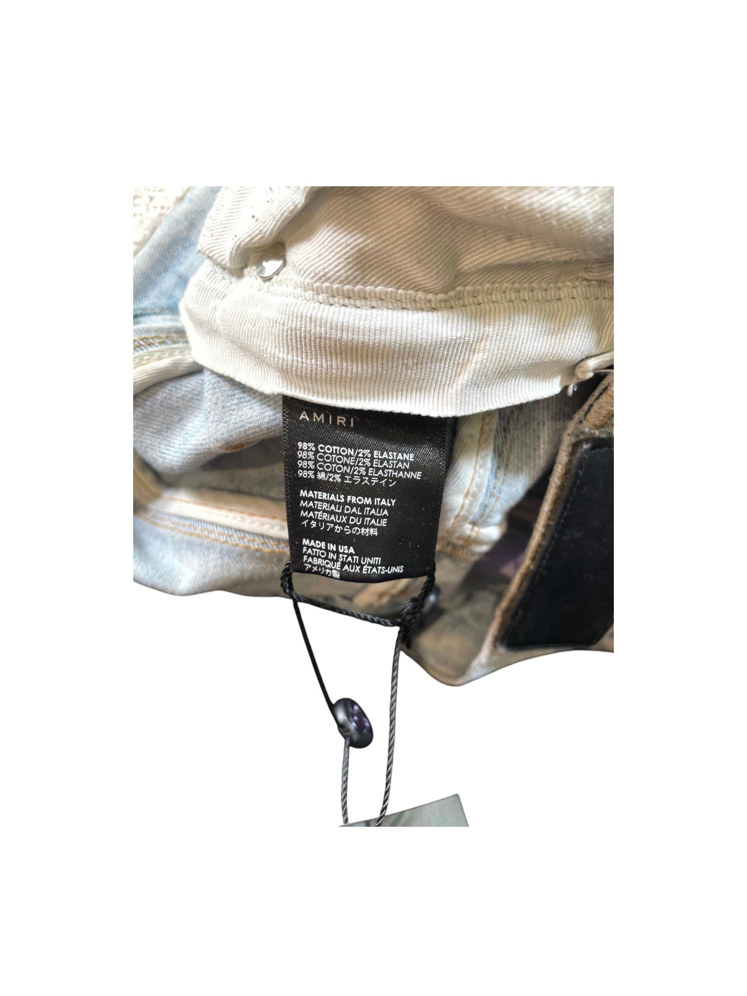 Amiri Tie Dye Patch "MX1" Light Wash Jeans